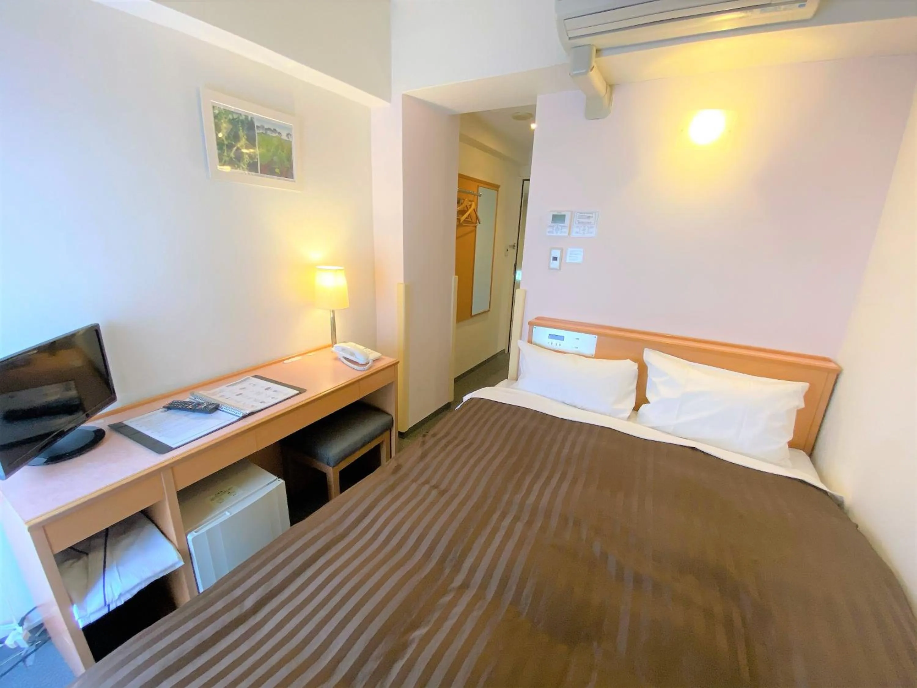 Bed in Sakura Hotel Hatagaya