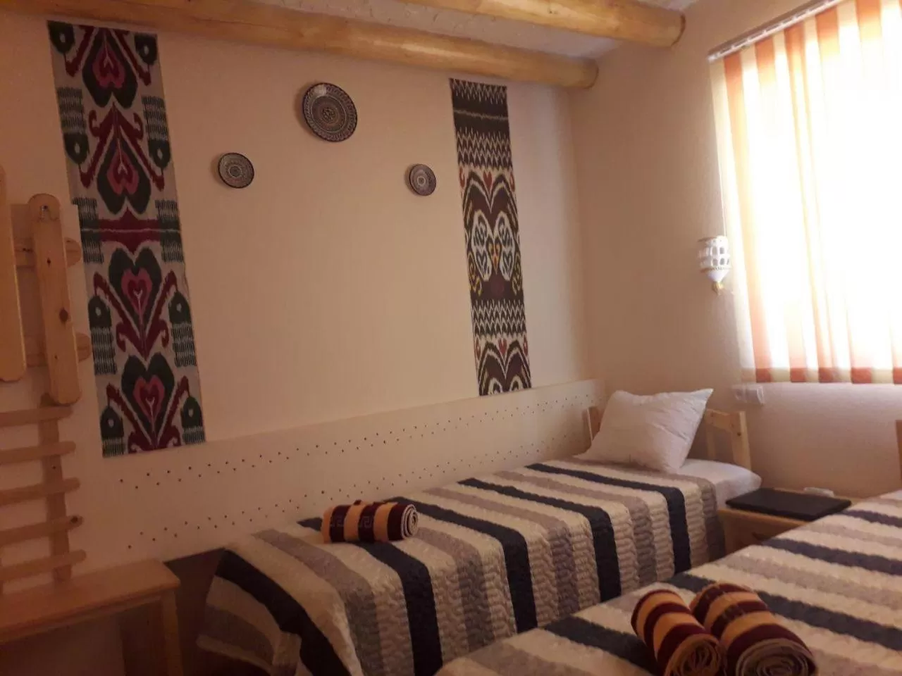 Bed in KHIVA ABDULLA Guest House