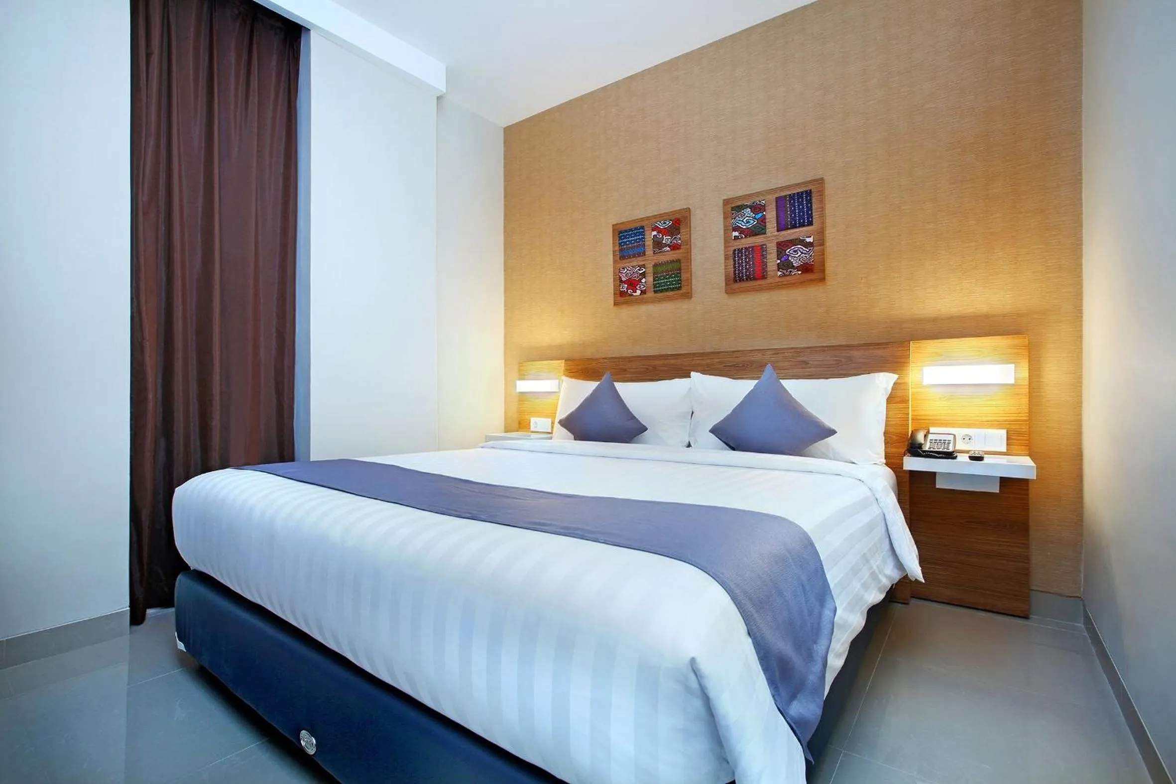 Bedroom, Bed in Hotel NEO Cirebon by ASTON