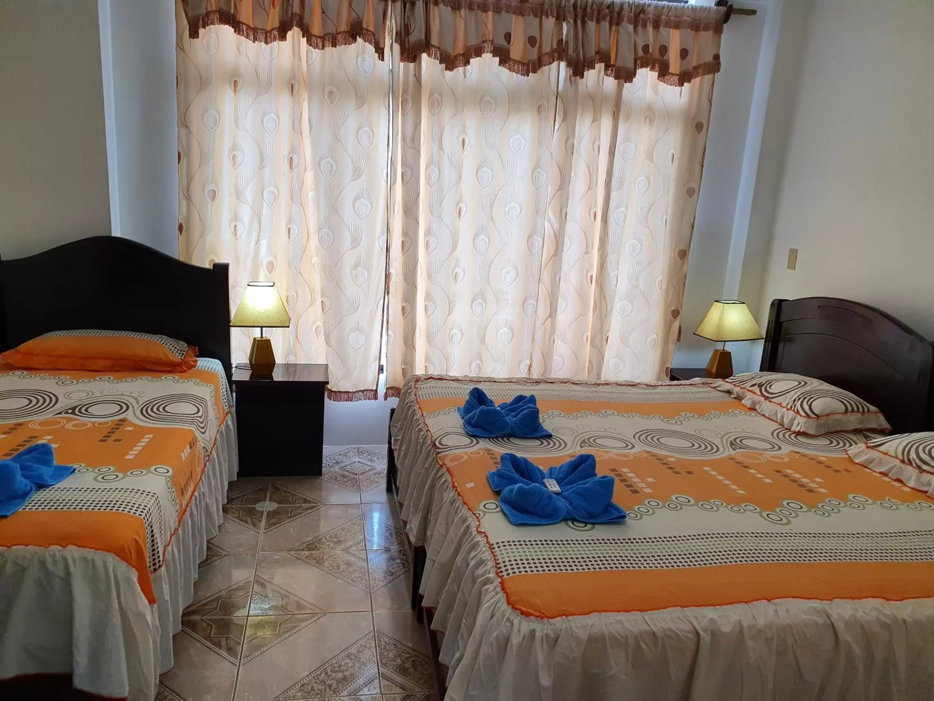 Triple Room in Hostal Cerro Azul Triple Room in Hostal Cerro Azul