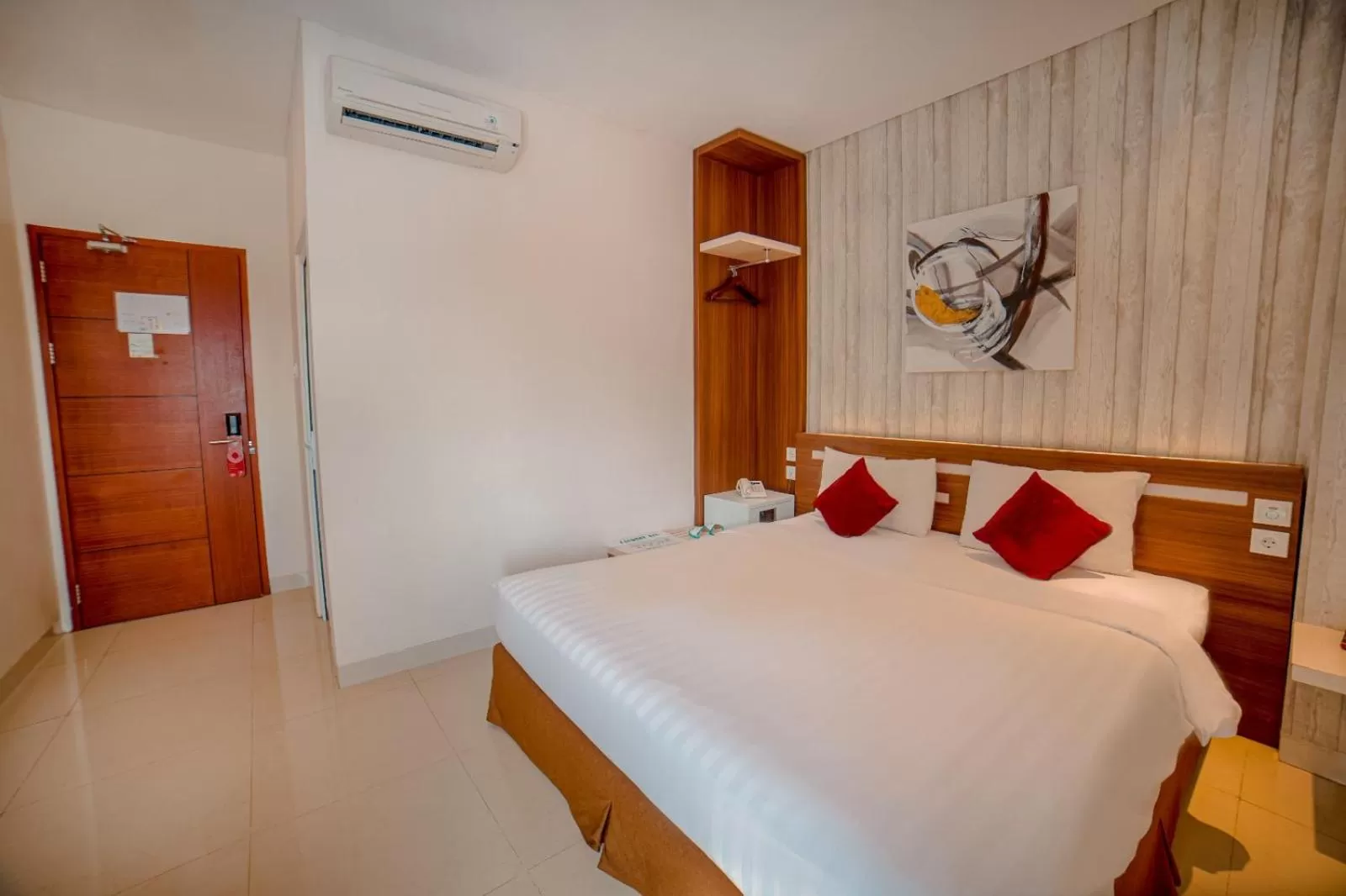 Bed in Zoom Hotel Mulawarman