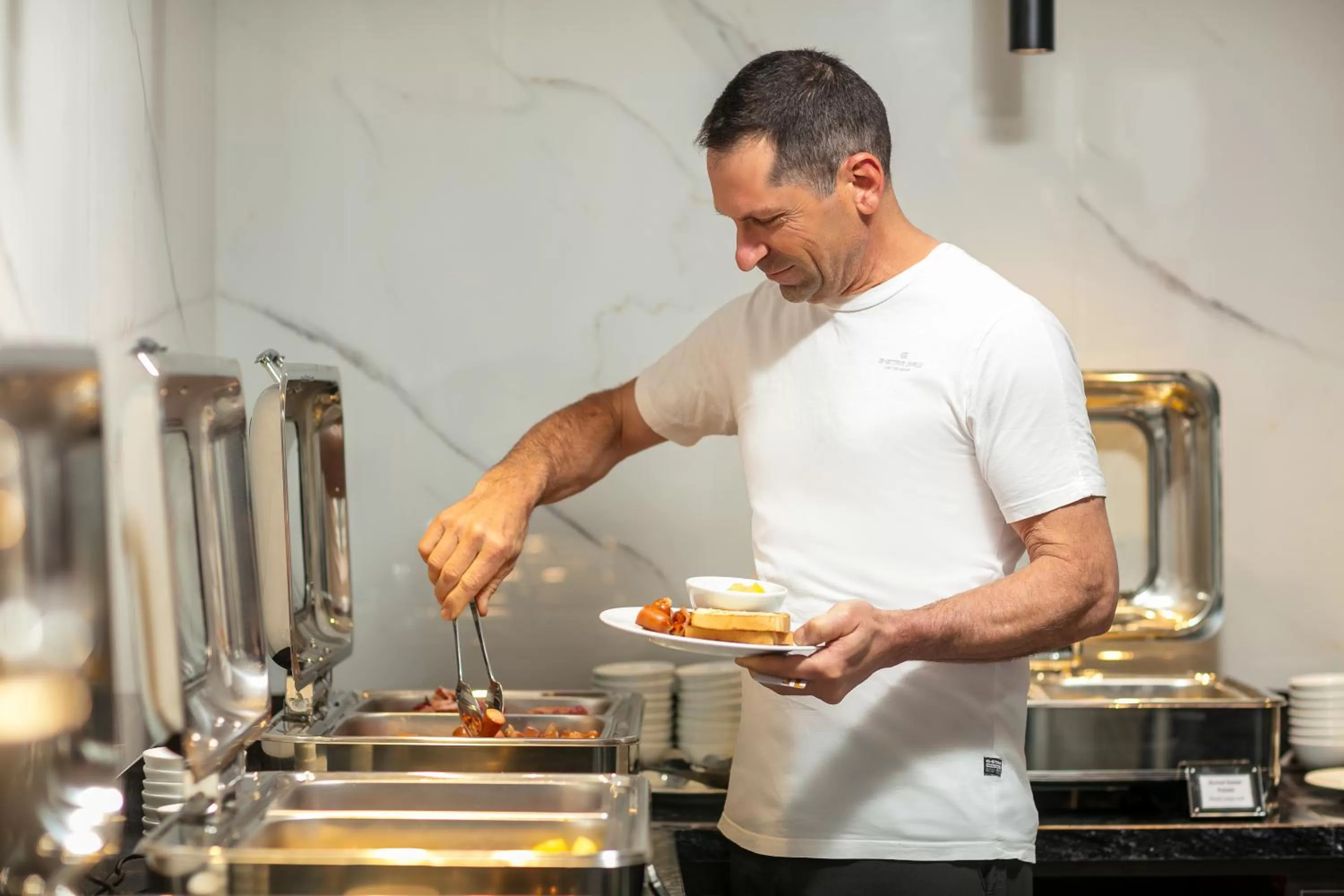 Buffet breakfast in MAY DE VILLE Lakeside Hotel