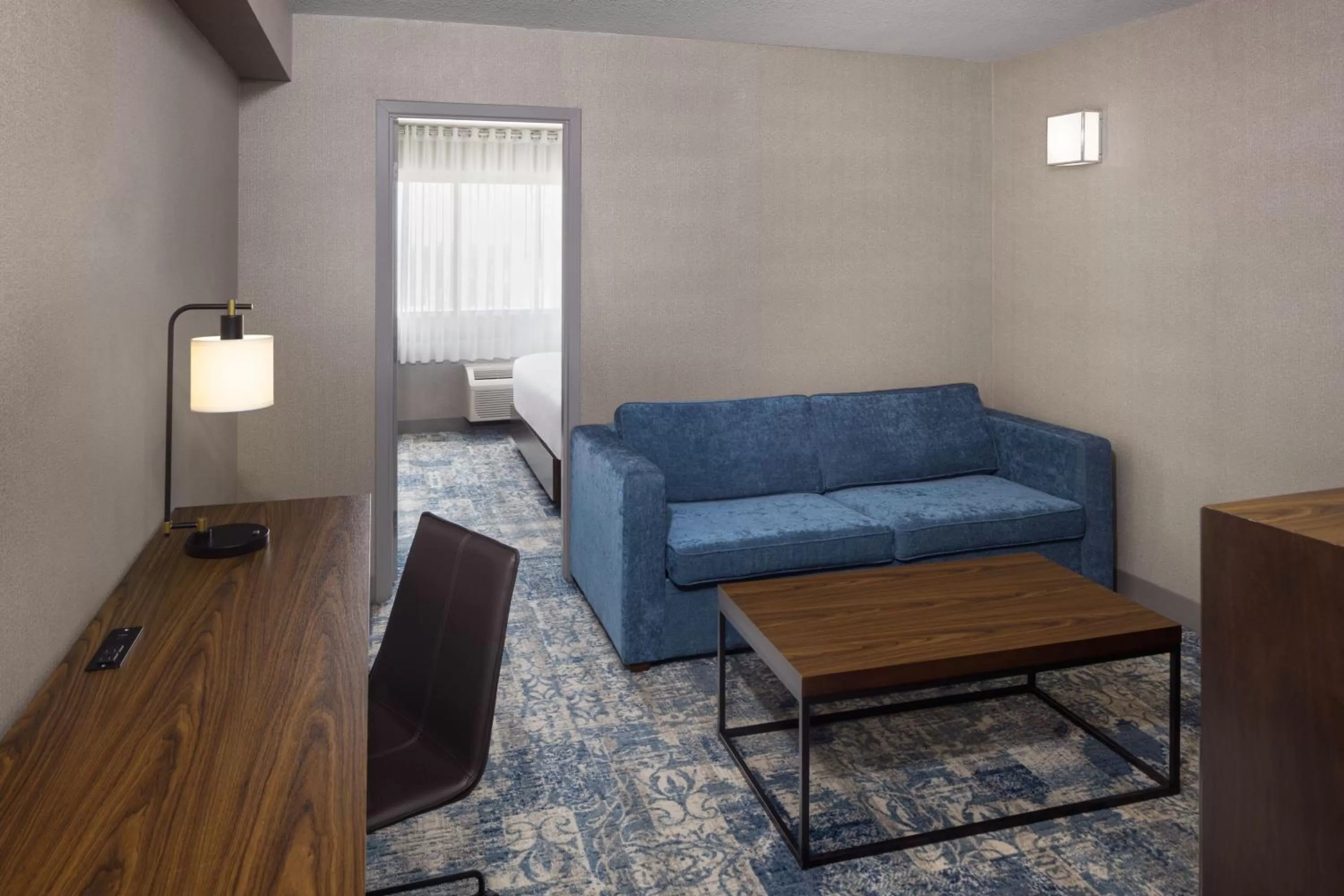 Living room in Four Points by Sheraton Edmonton South