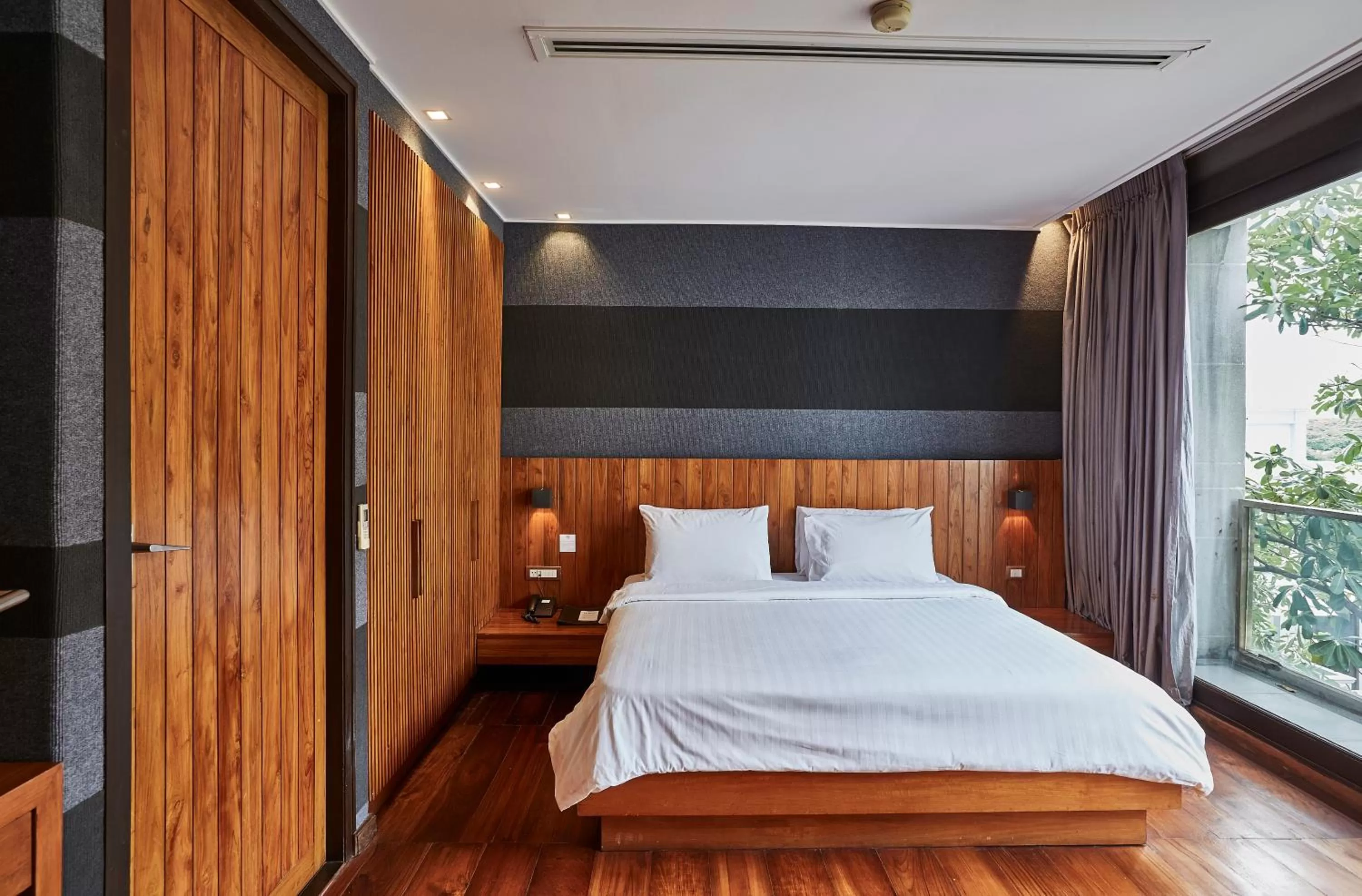 Bed in LUXX Langsuan Hotel - SHA Plus