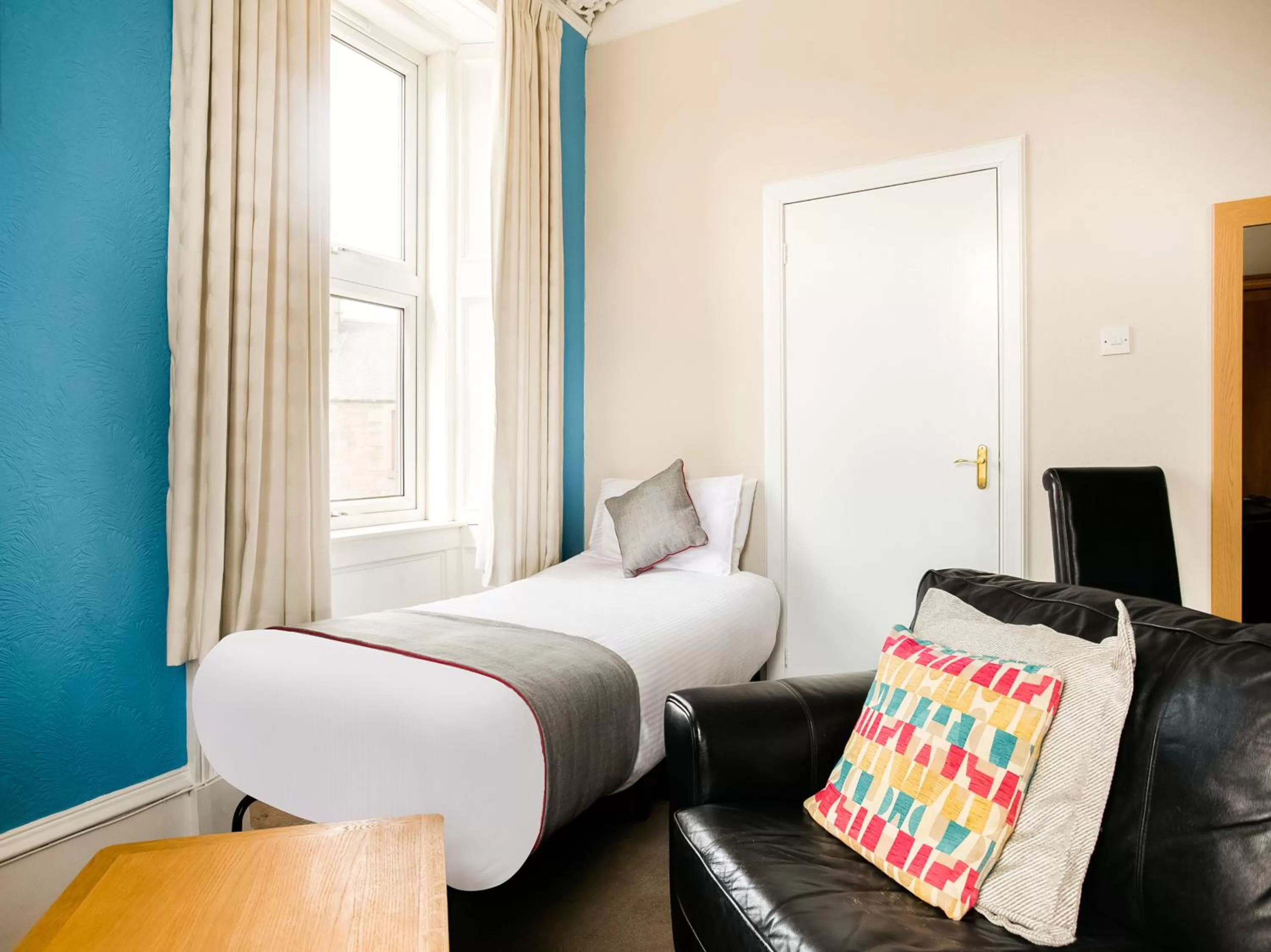 Photo of the whole room, Bed in Corner Hotel