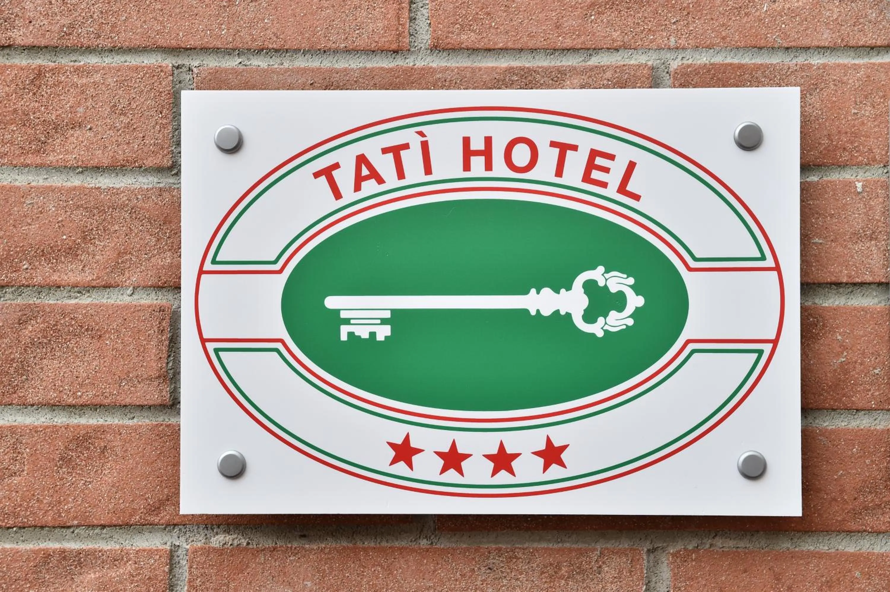 Property logo or sign in Tatì Hotel