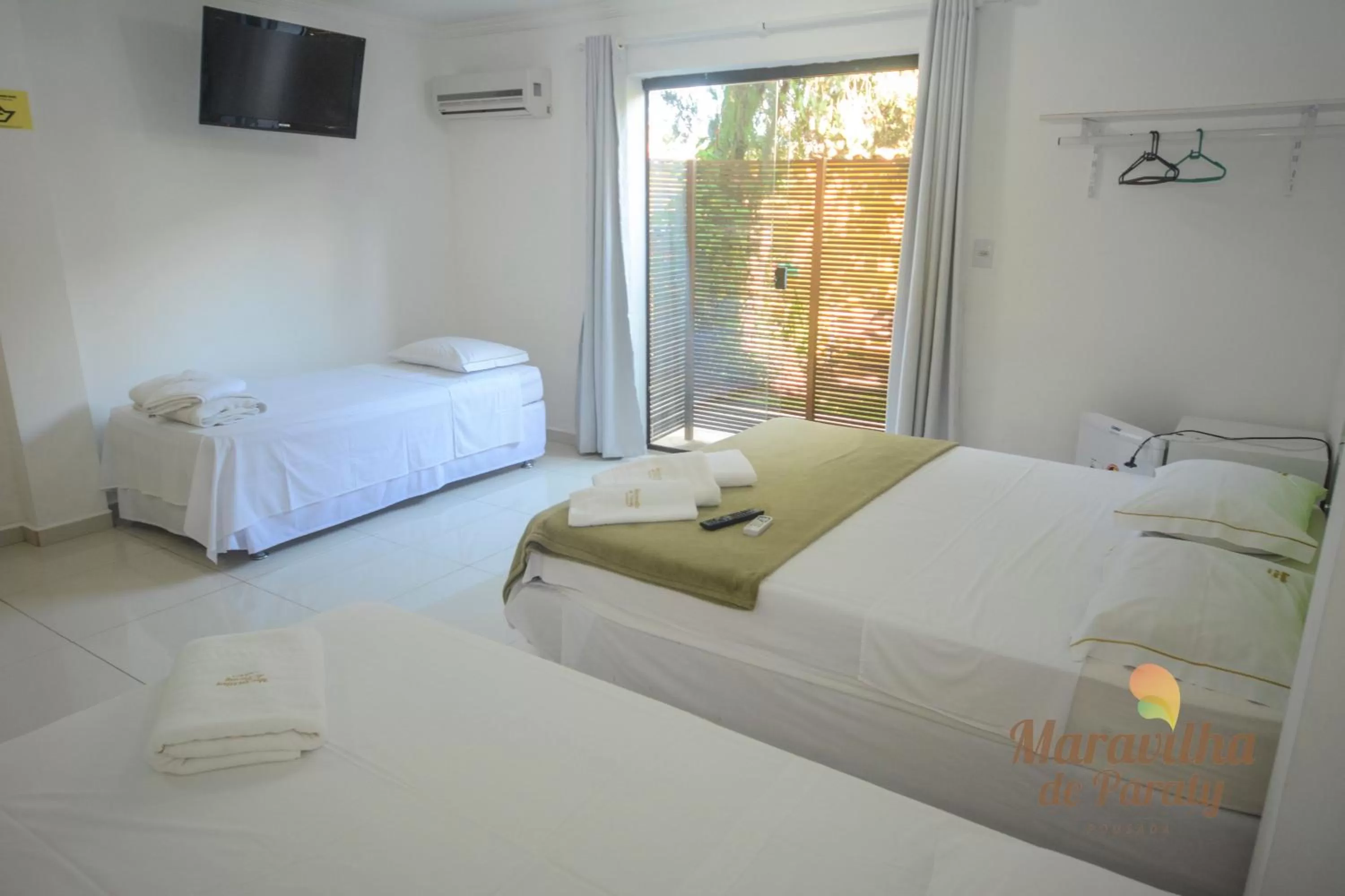 Photo of the whole room, Bed in Pousada Maravilha de Paraty