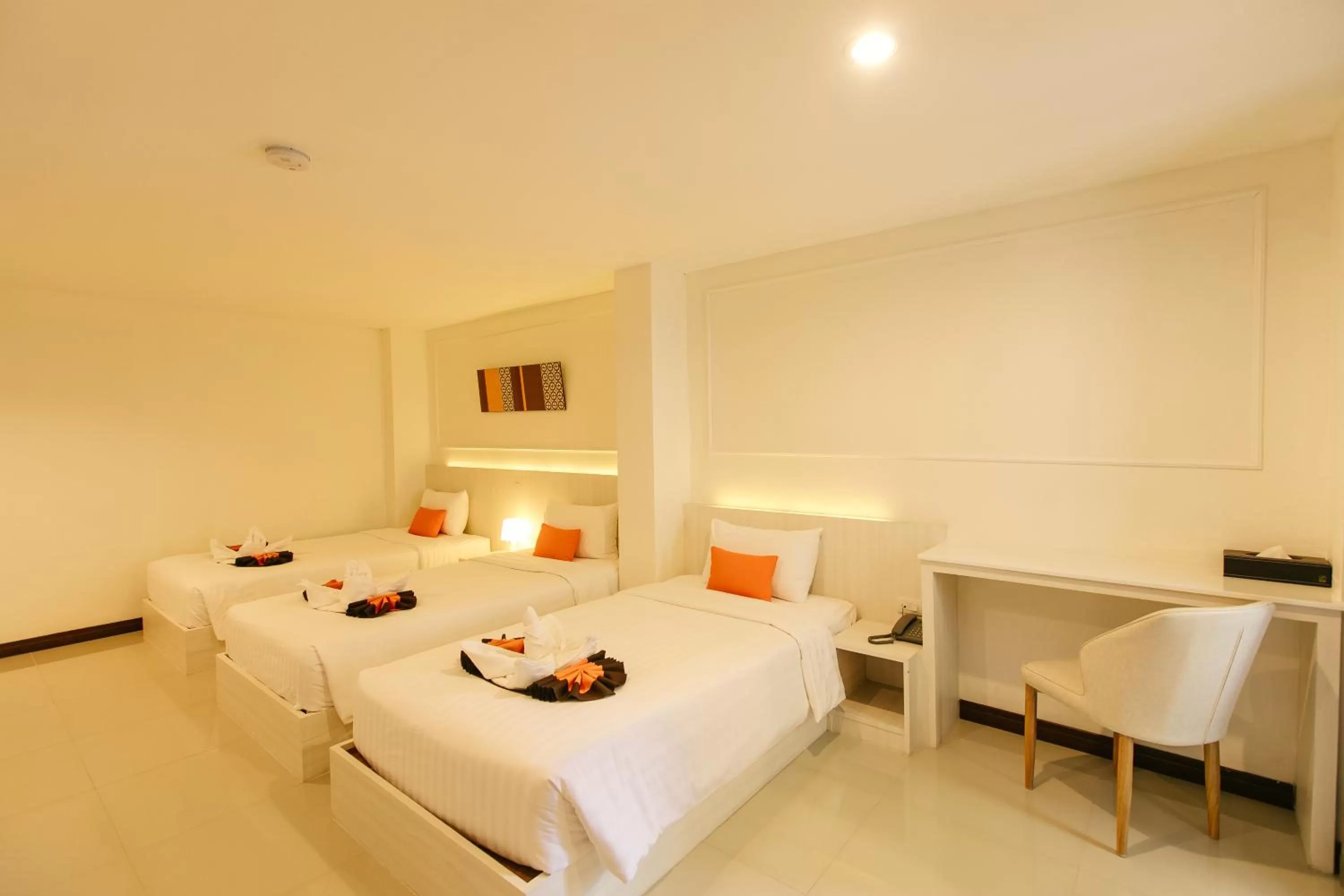 Bed in De Hug Hotel & Residence