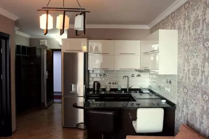 Kitchen/Kitchenette in Orbi Lux Apartment