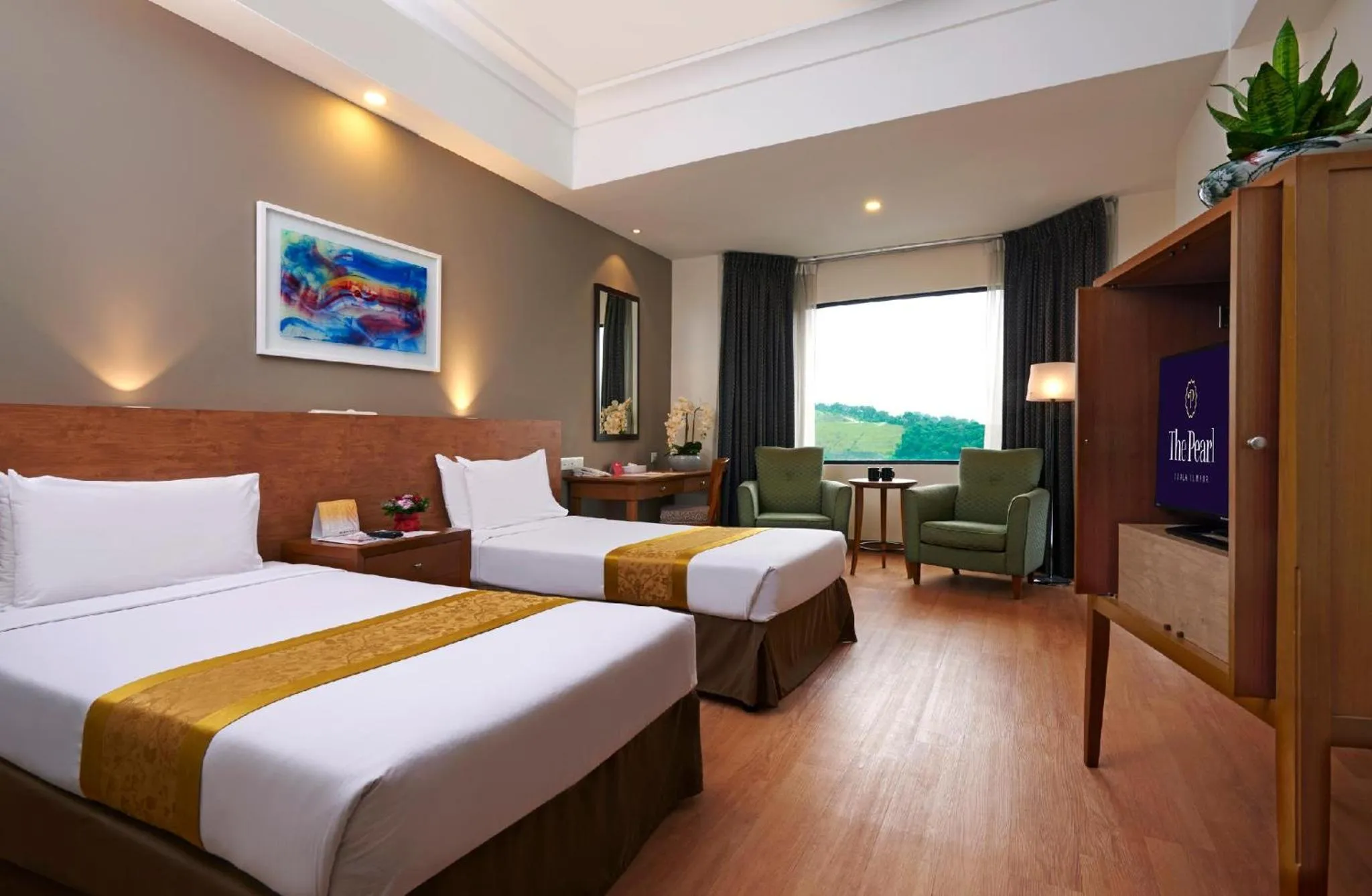 Bedroom in Pearl International Hotel