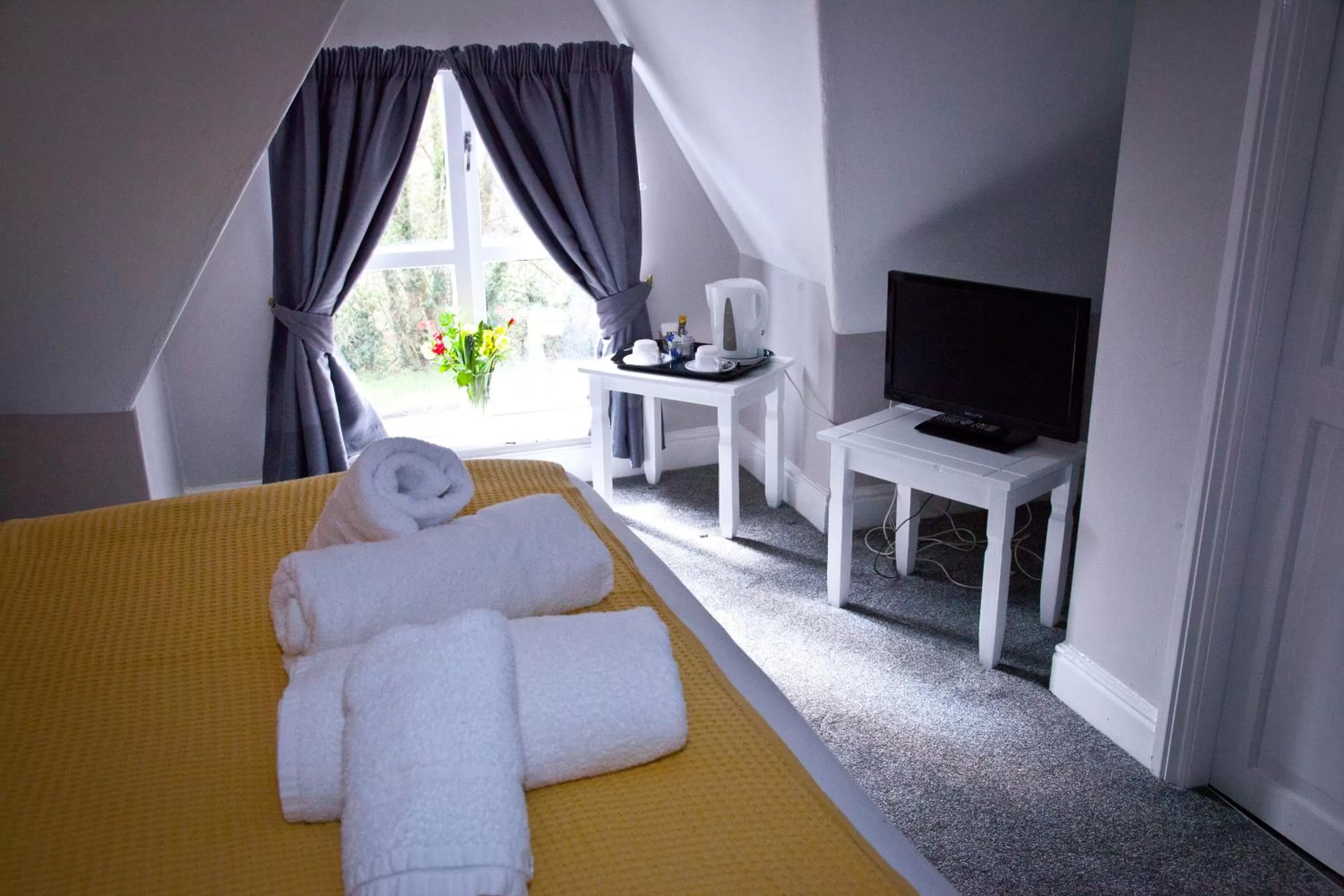 Bed in Rowton Poplars Hotel