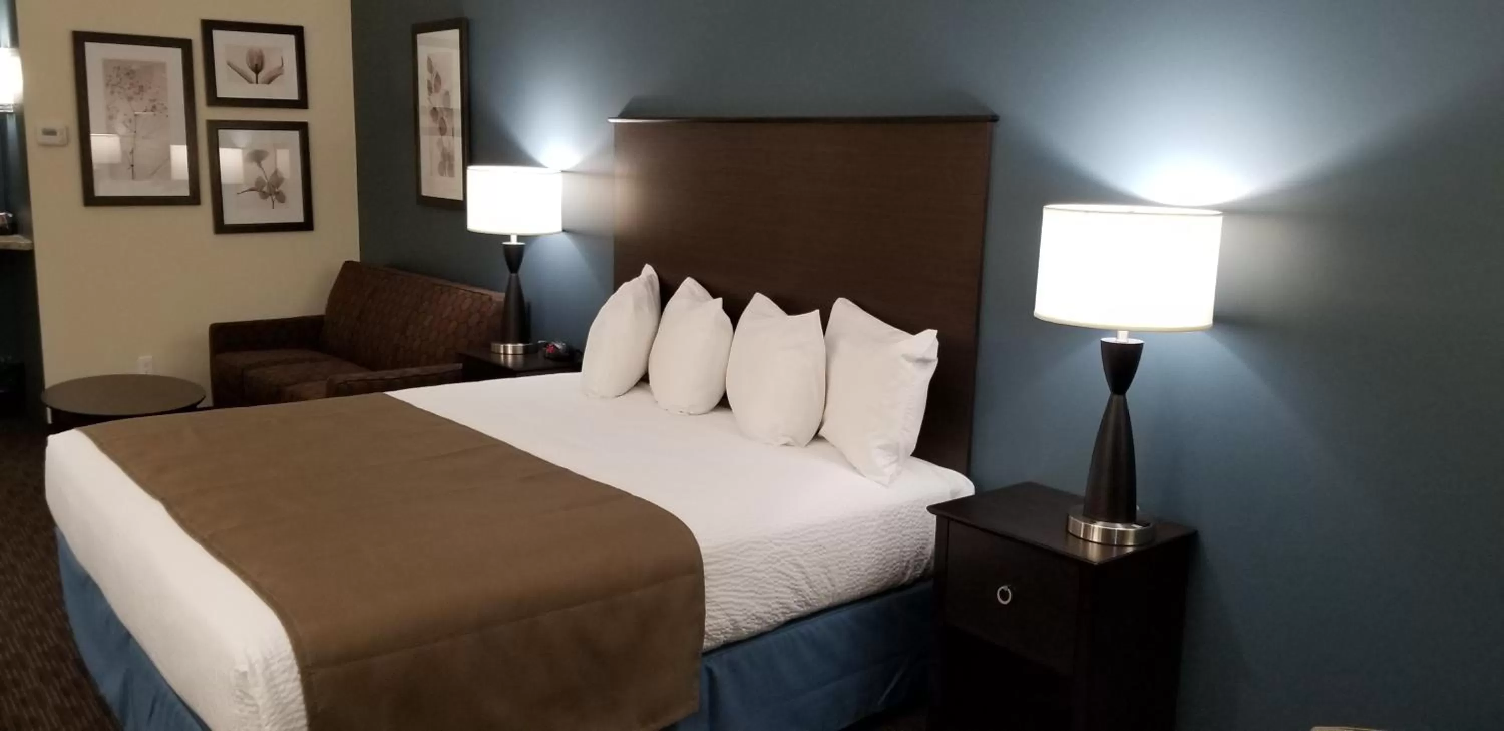 Bed in AmericInn by Wyndham Sioux Falls North