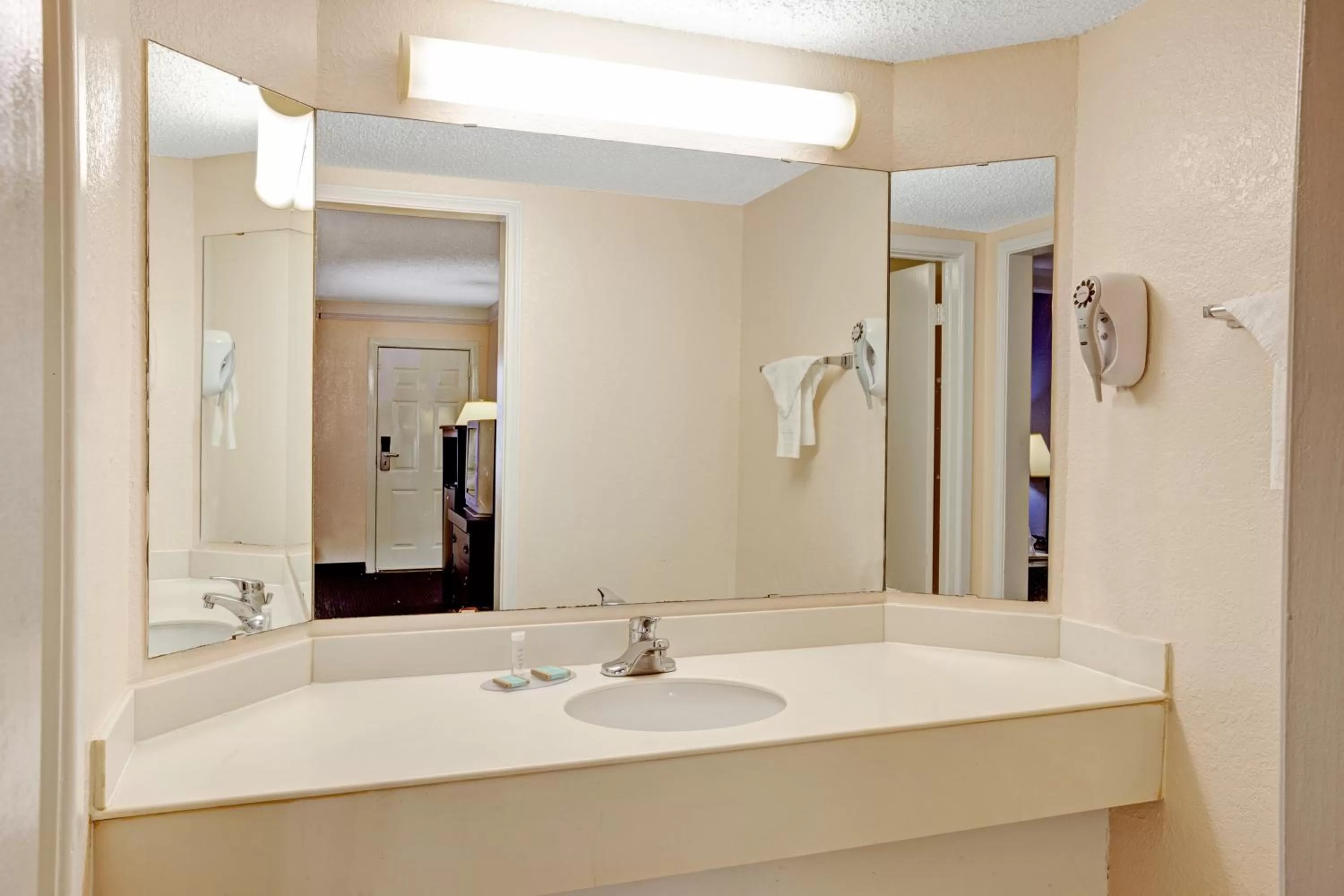 Bathroom in Travelodge by Wyndham North Richland Hills/Dallas/Ft Worth