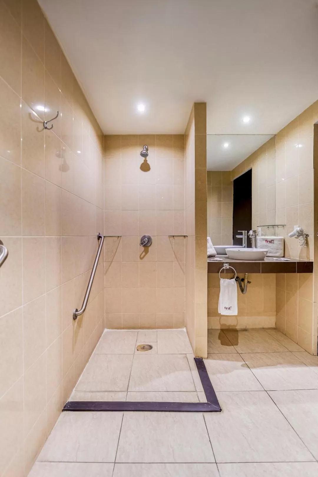 Shower in First Inn Hotel & Business