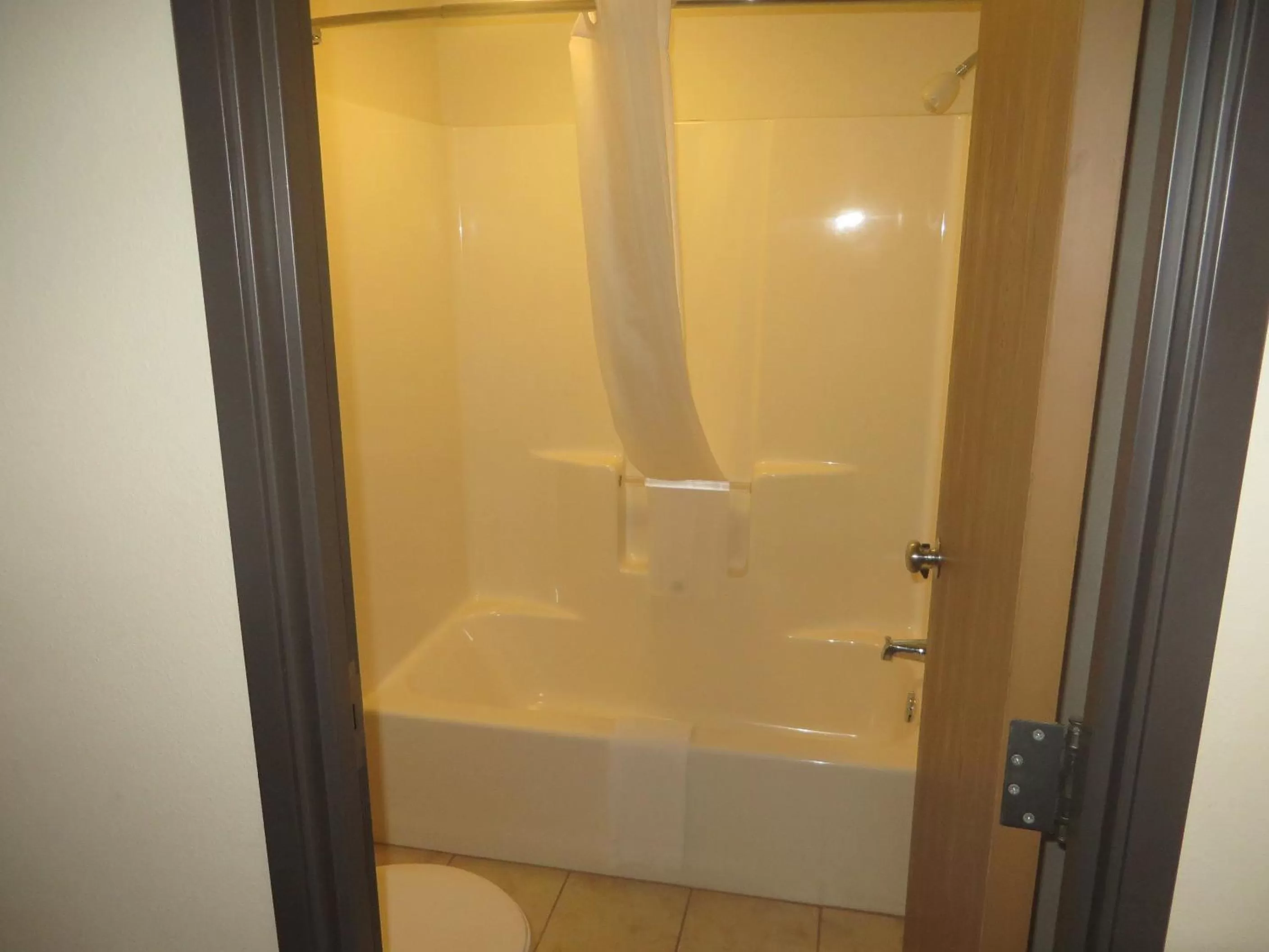 Studio Suite with Two Queen Beds and One Twin Bed - Non-Smoking in AmericInn by Wyndham Rice Lake