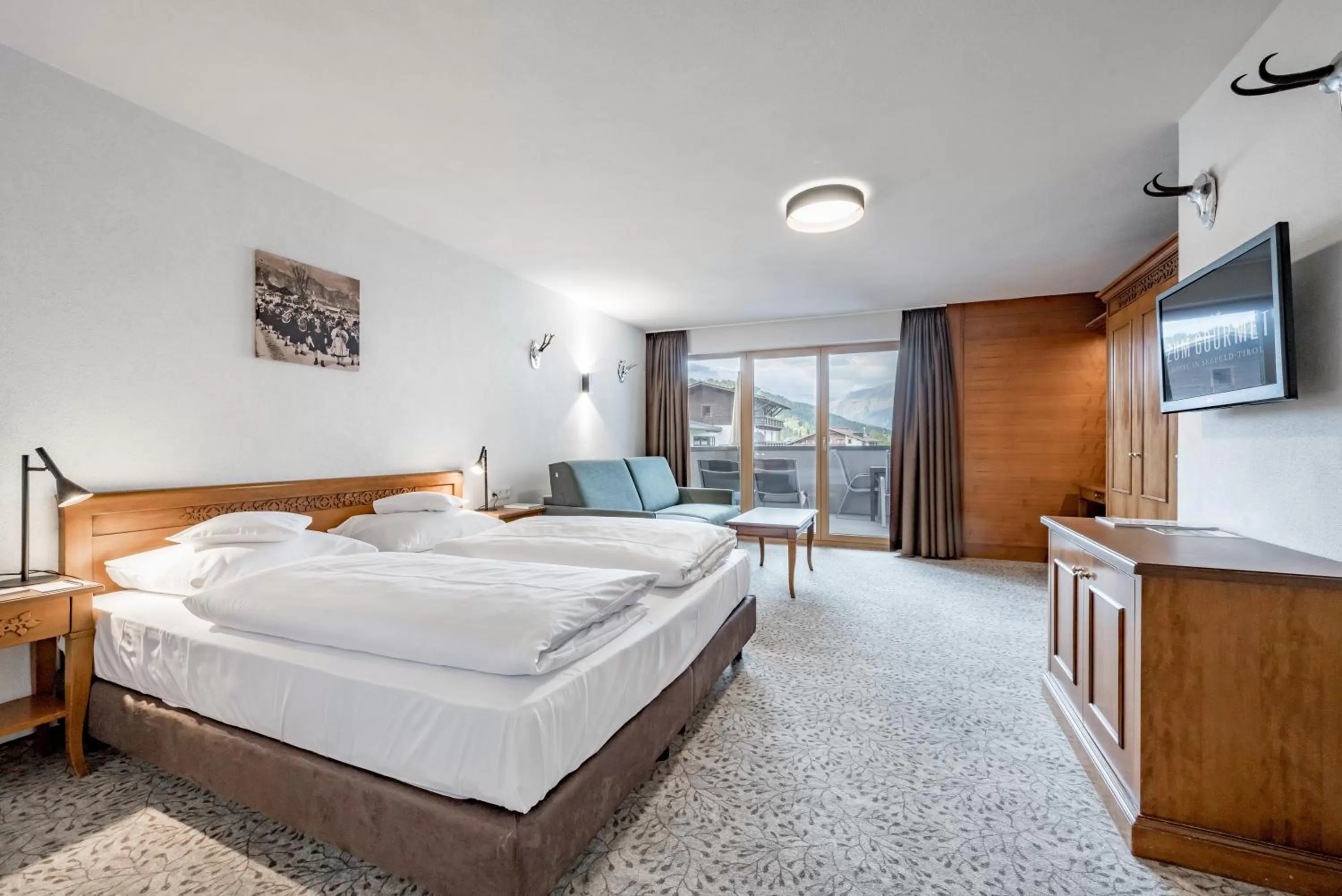 Photo of the whole room, Bed in Hotel Zum Gourmet