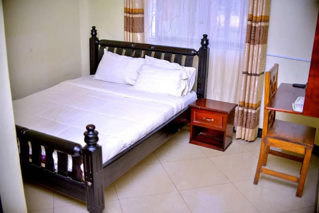 Bed in Acactus Hotel