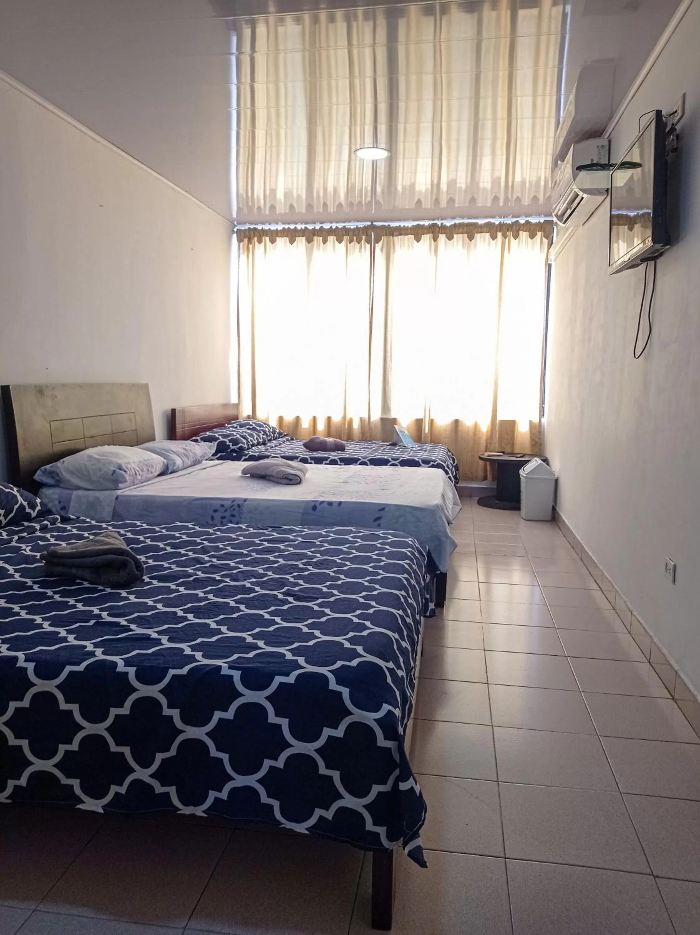 Bed in Posada Cultural Bahia Sonora