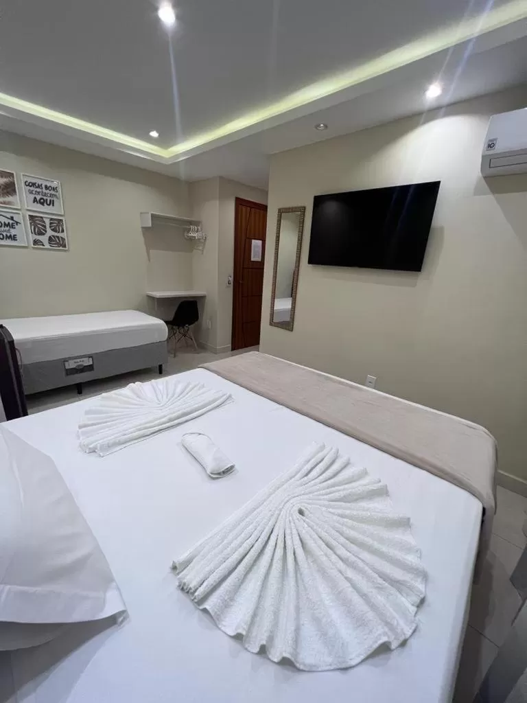 Bed in Pousada Arraial Tropical