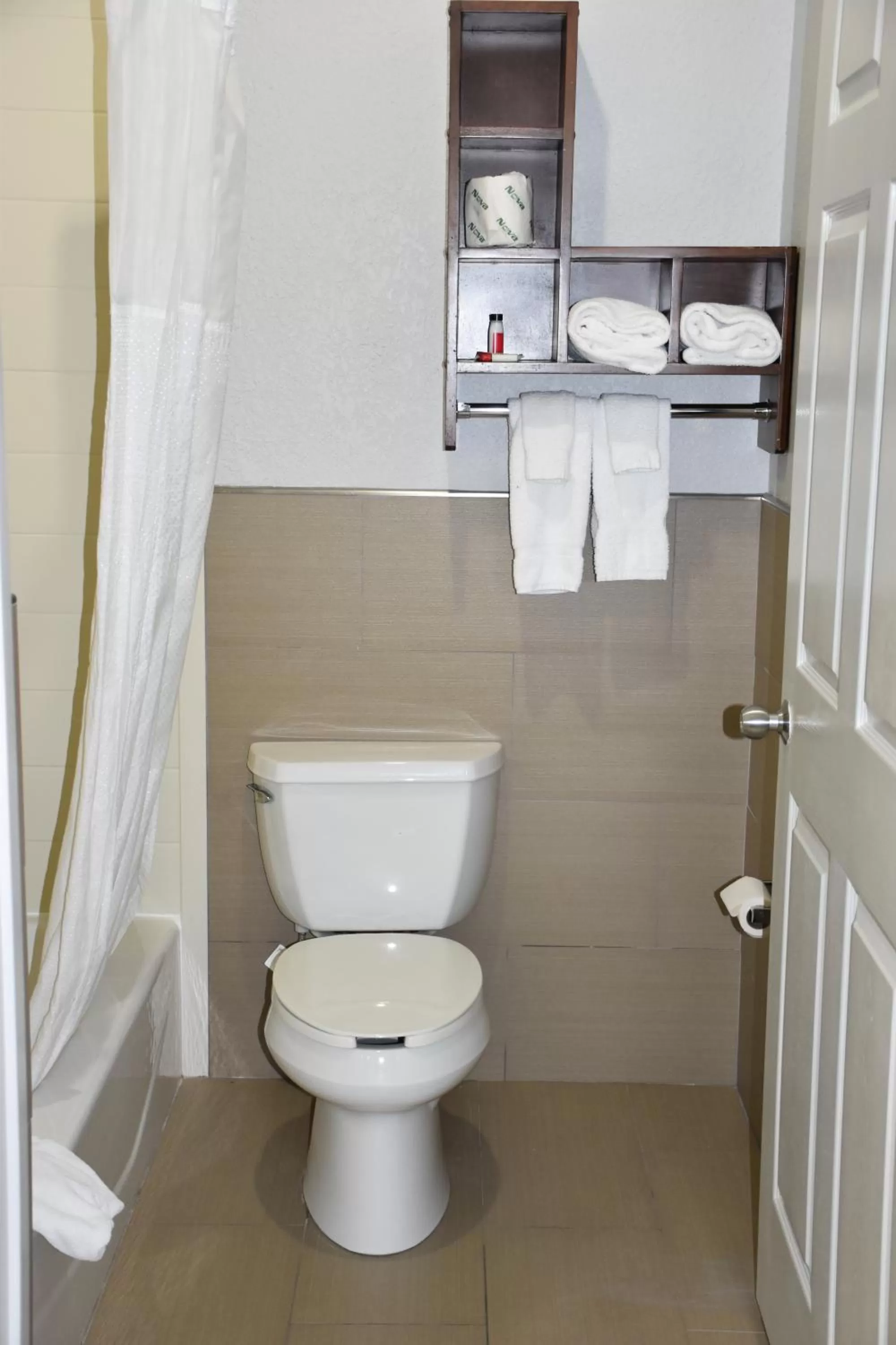 Bathroom in Super 8 by Wyndham Houston Hobby Airport South