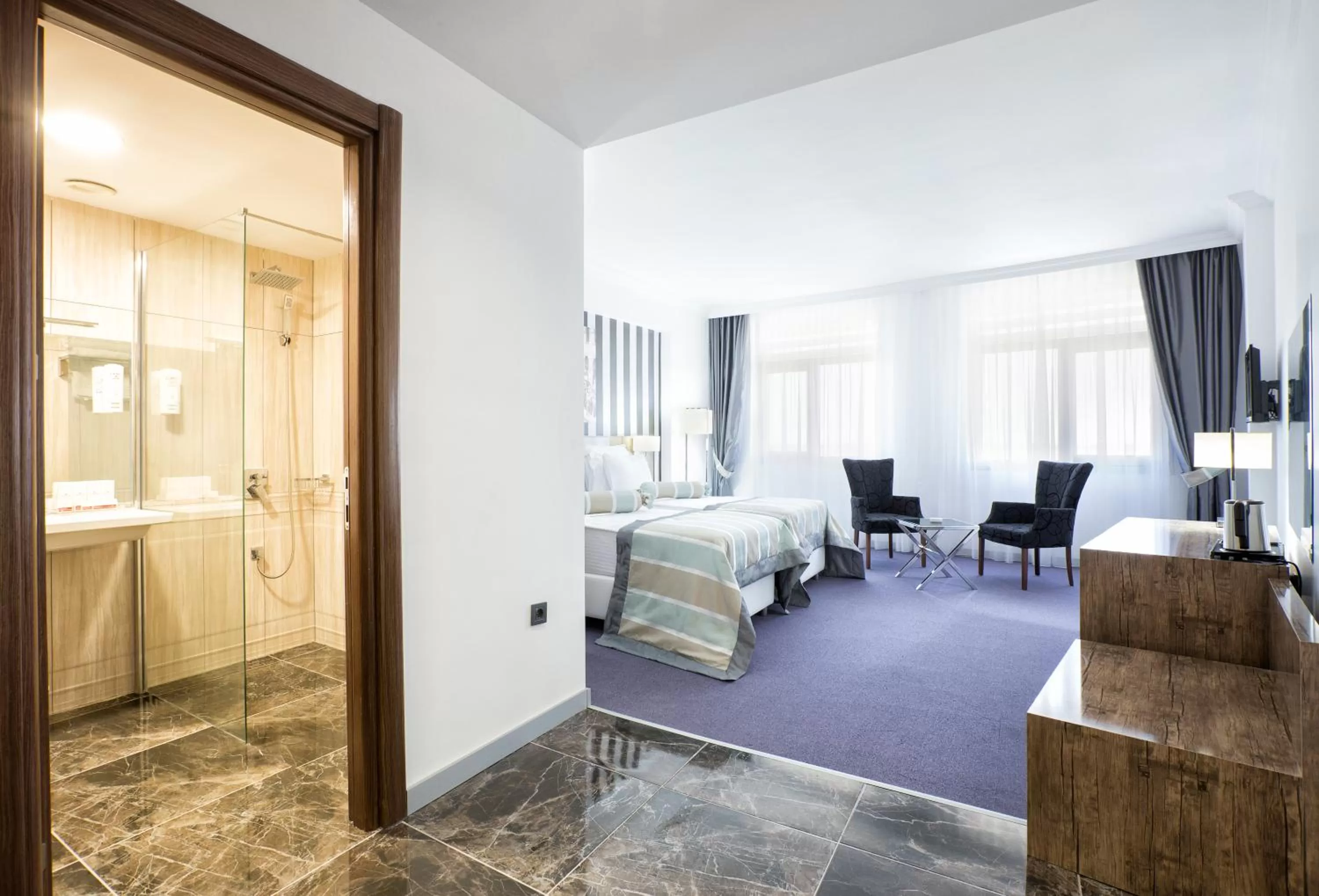 Communal lounge/ TV room, Bed in Ramada Hotel by Wyndham Edirne