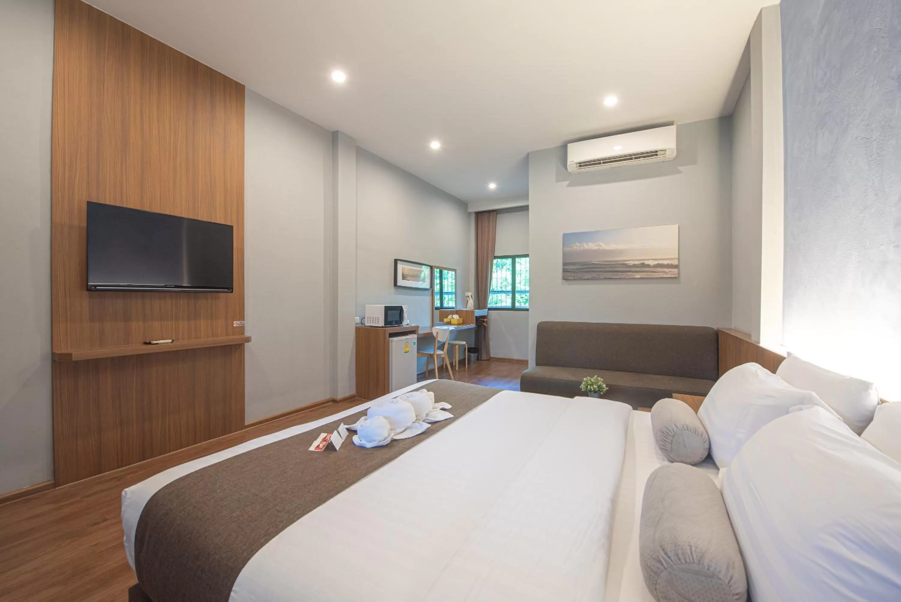 Bed in Tarnsiri Boutique Resort