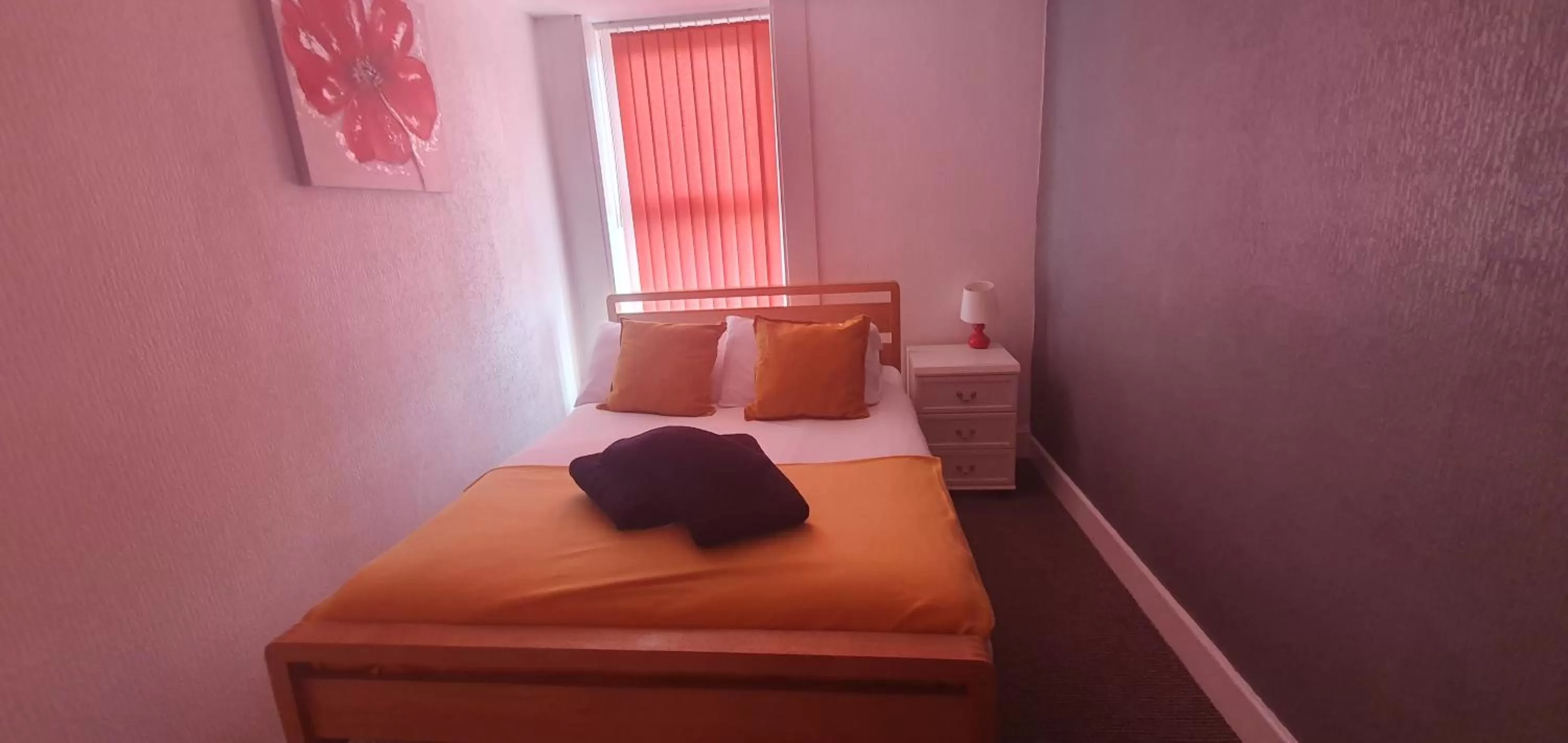 Bed in Palm Beach Hotel by the Sea