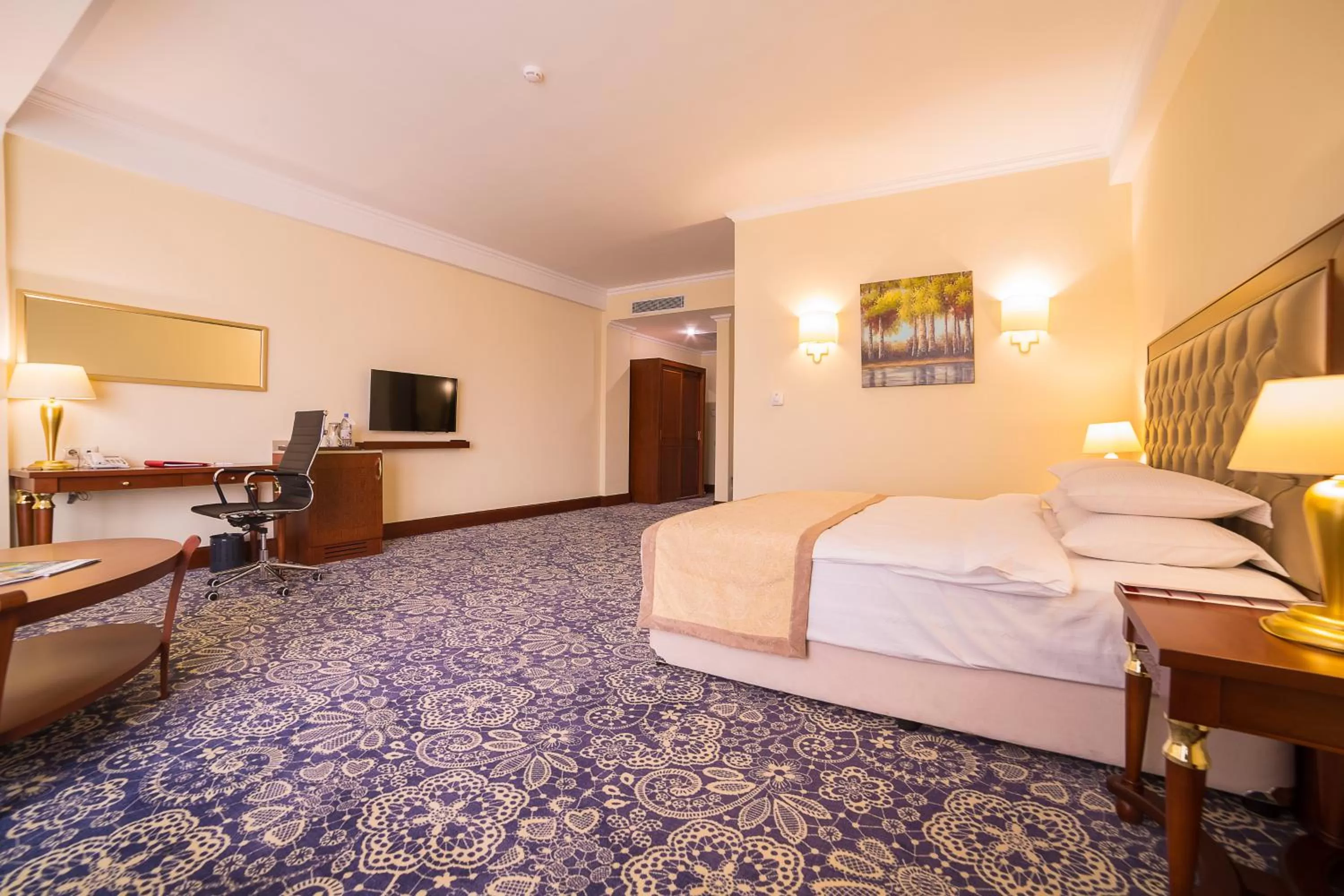 Bedroom, Bed in Ramada by Wyndham Almaty