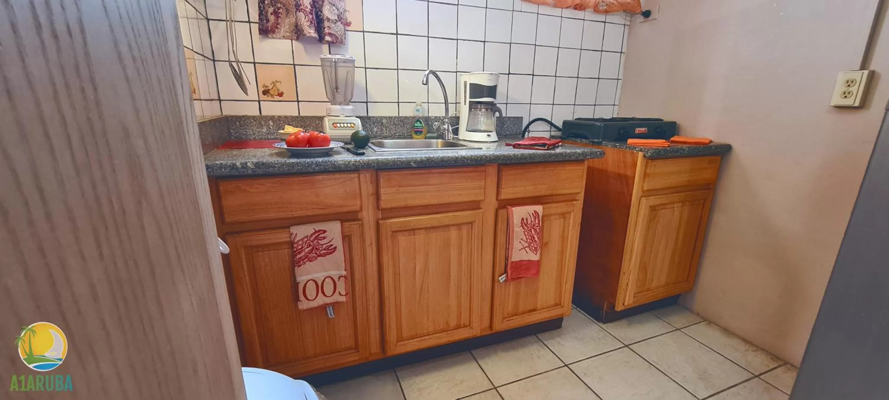 Kitchen or kitchenette in A1 Apartments Aruba