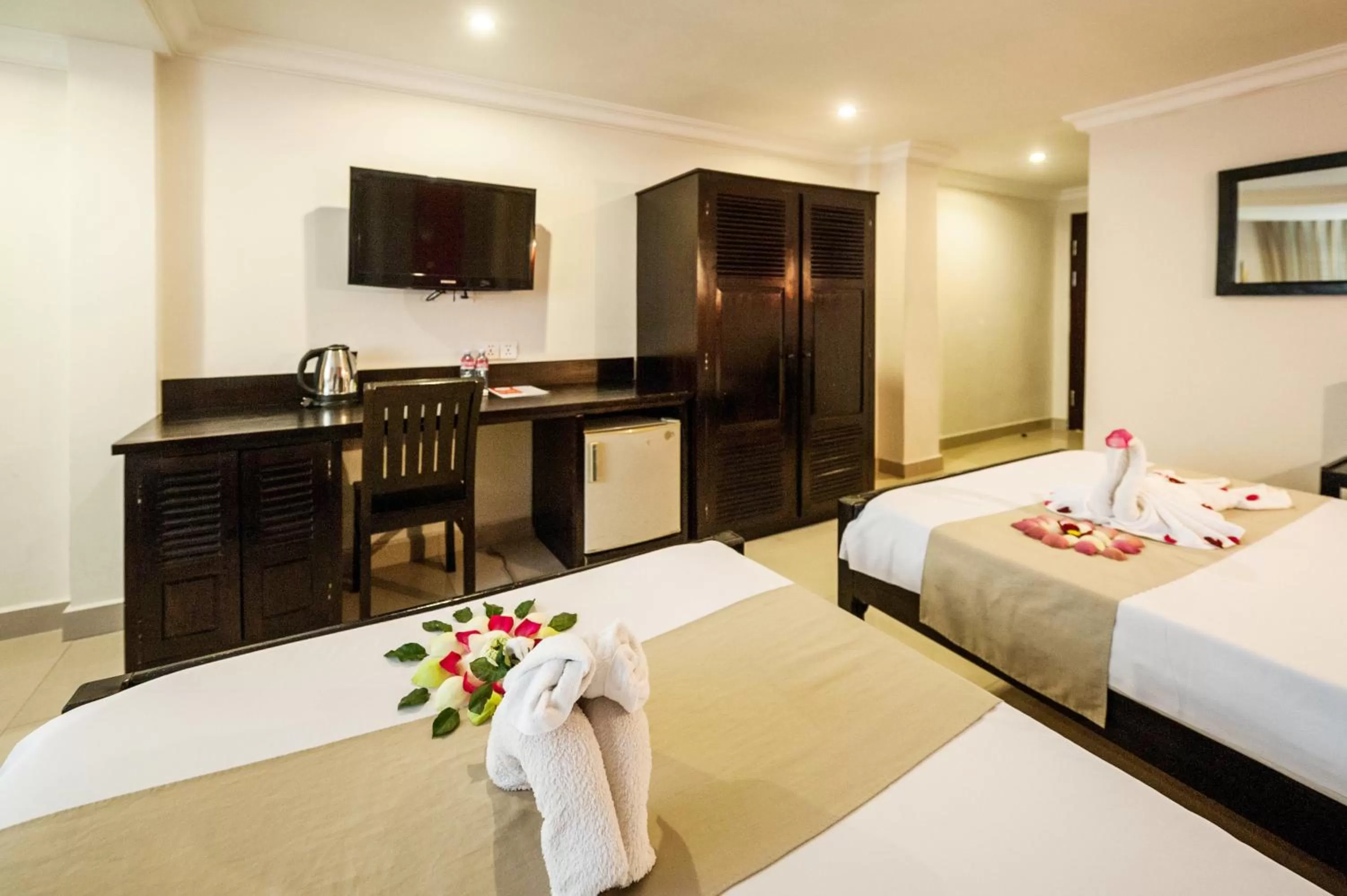 Bed in Angkor International Hotel