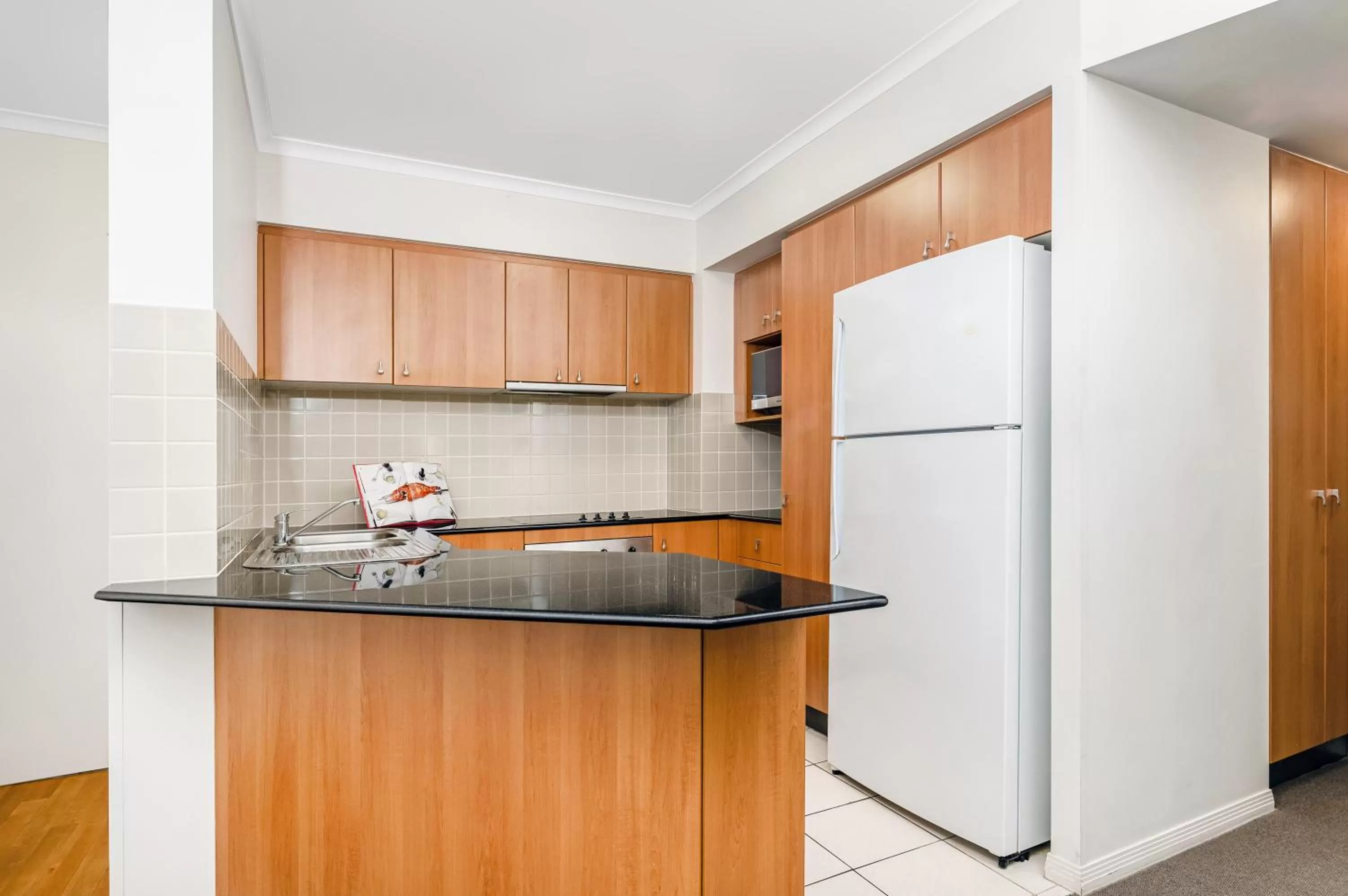 Kitchen or kitchenette in Mantra Coolangatta Beach