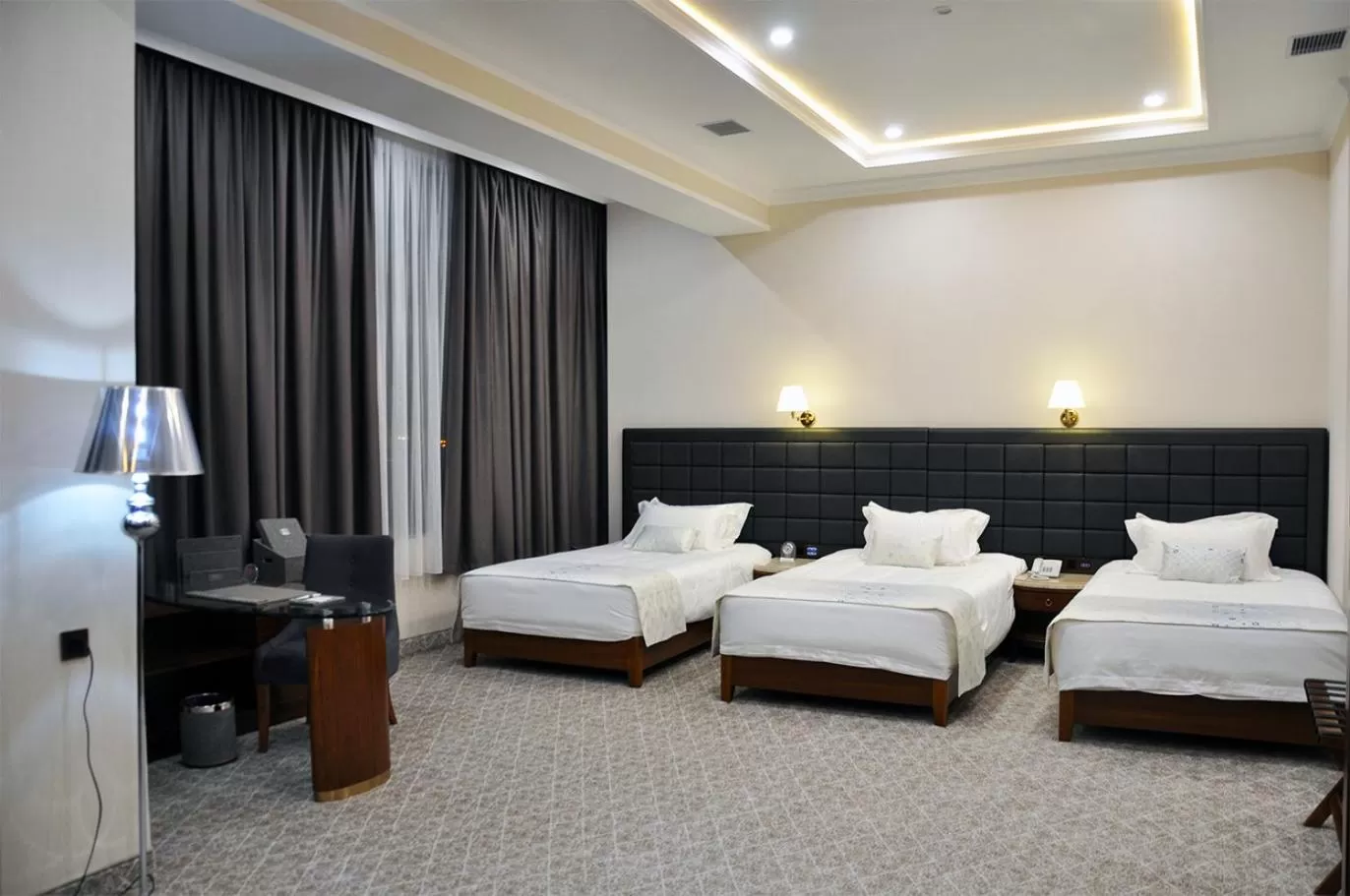 Bed in Parliament Palace Hotel