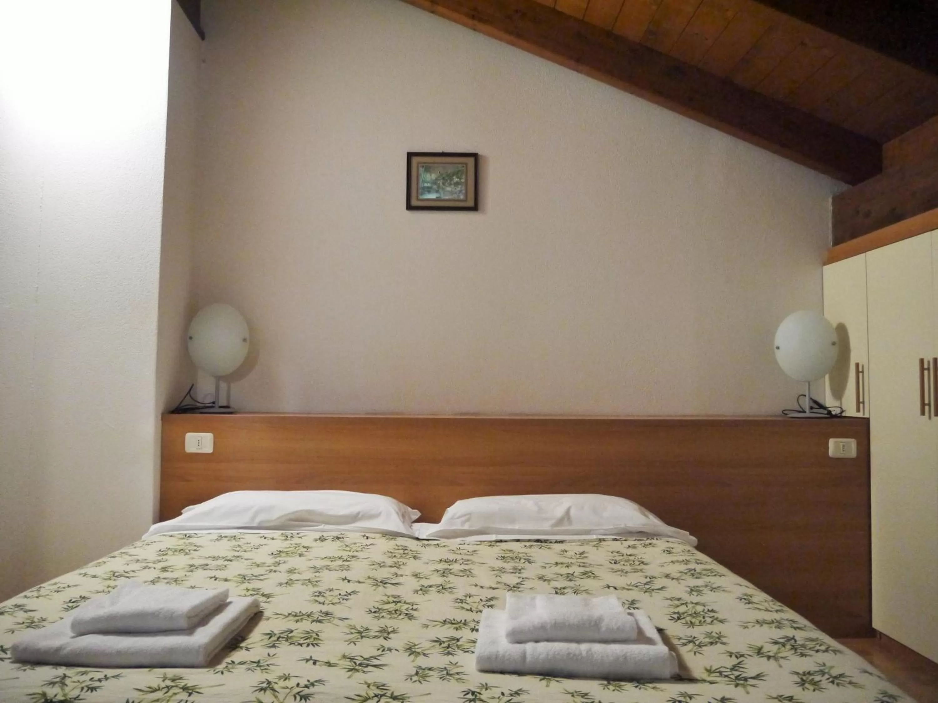 Bed in Hotel Oasi