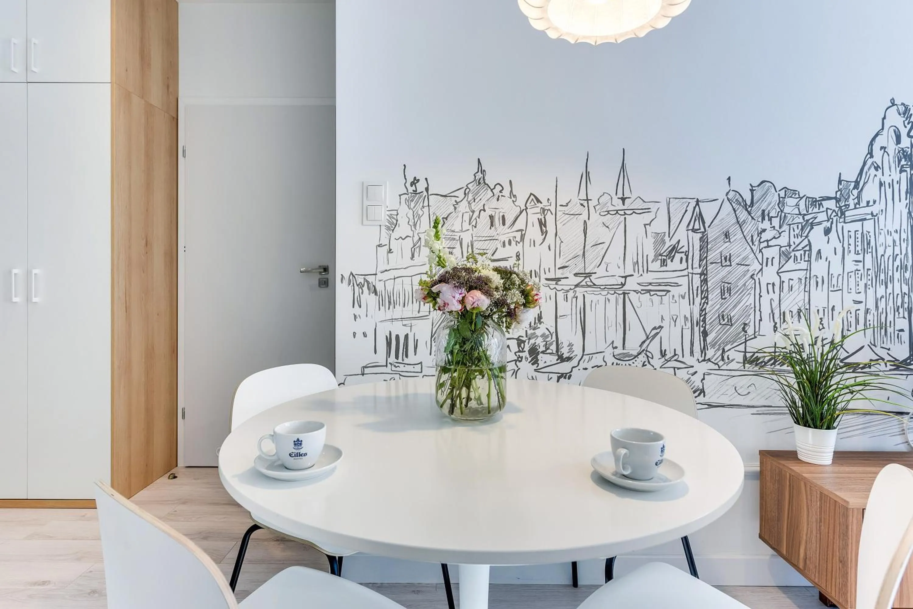 Dining area in GRANO APARTMENTS Gdańsk Motława SPA & Wellness