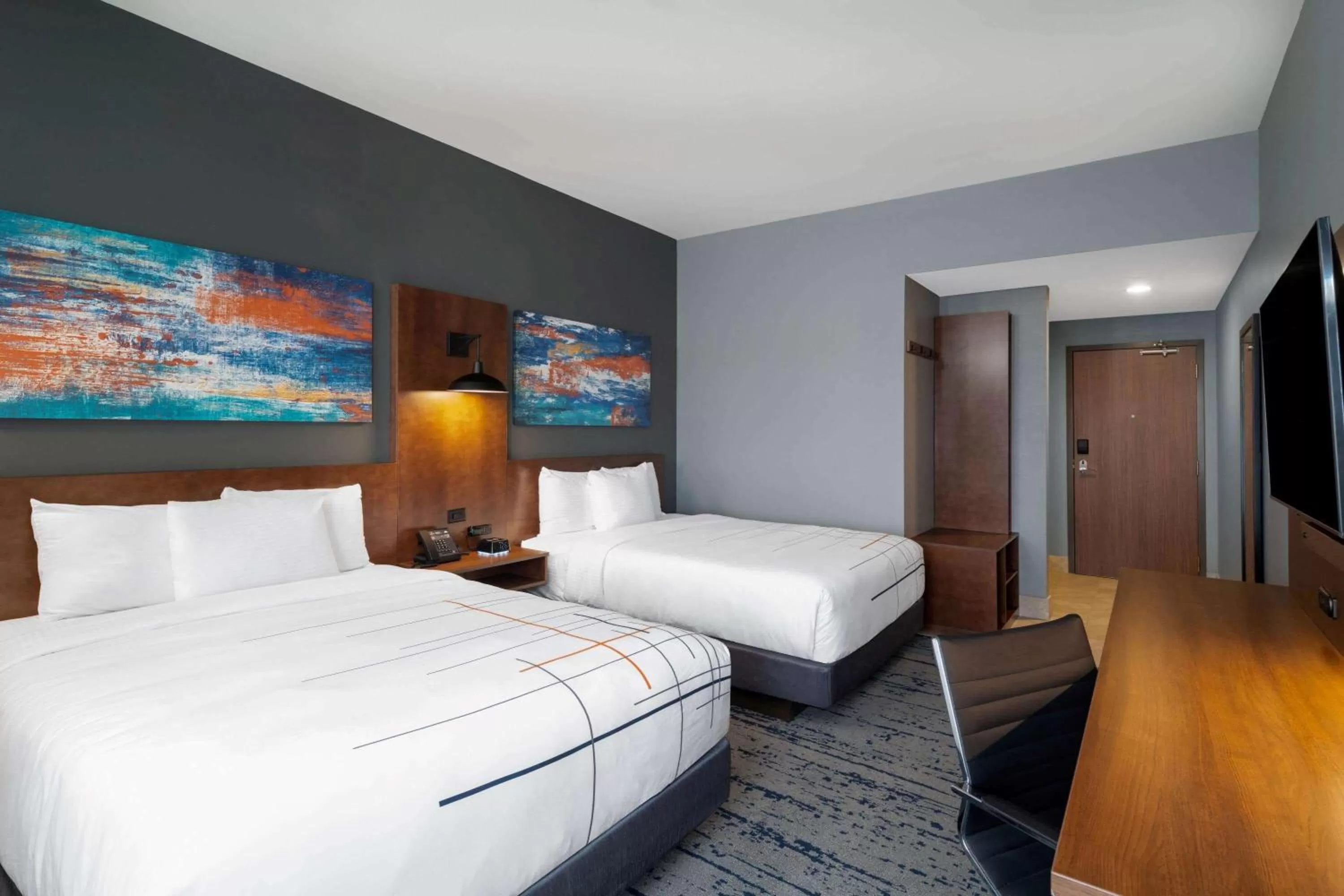 Photo of the whole room, Bed in La Quinta Inn & Suites by Wyndham Louisville NE - Old Henry Rd