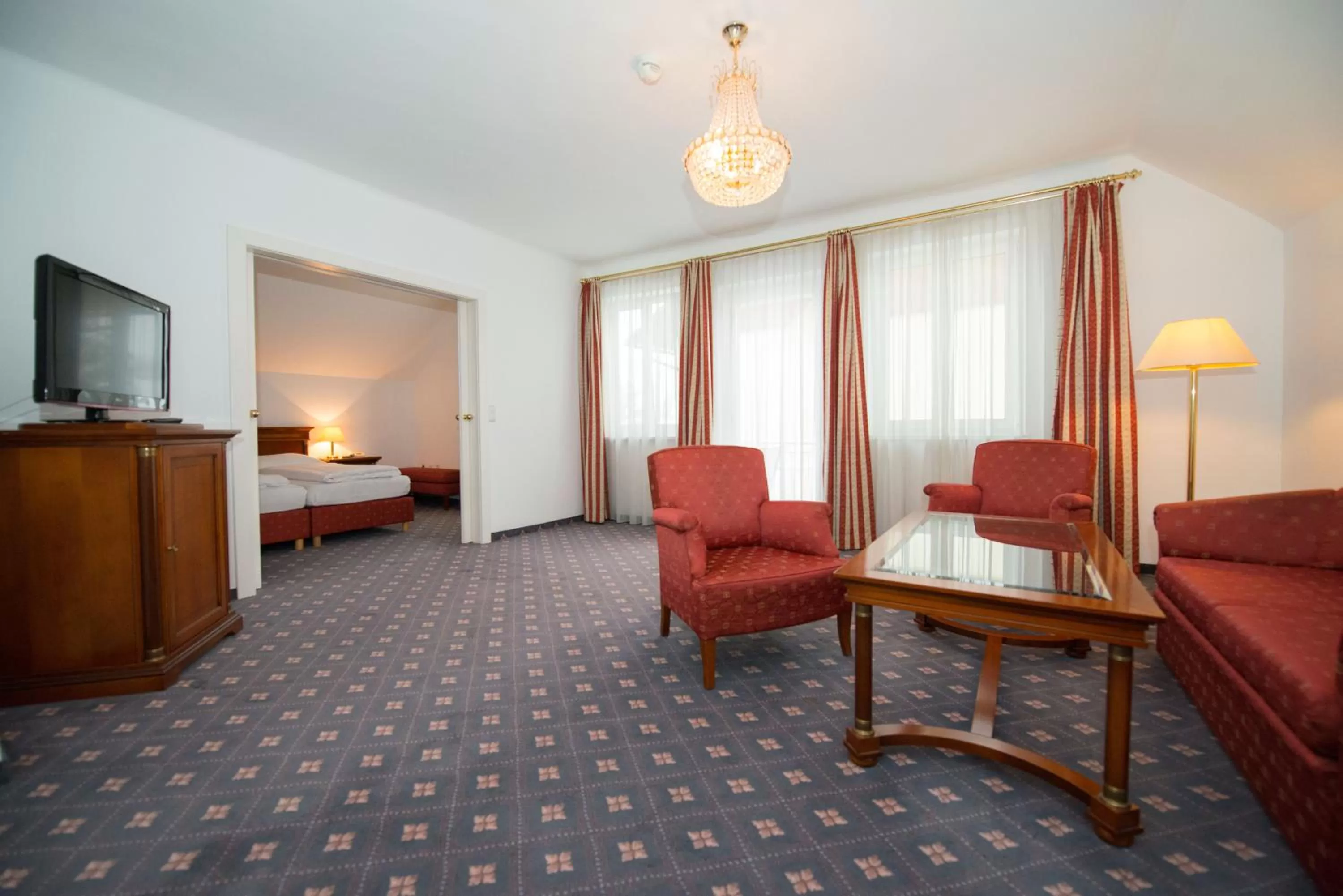 Seating area, Bed in Parkhotel Styria