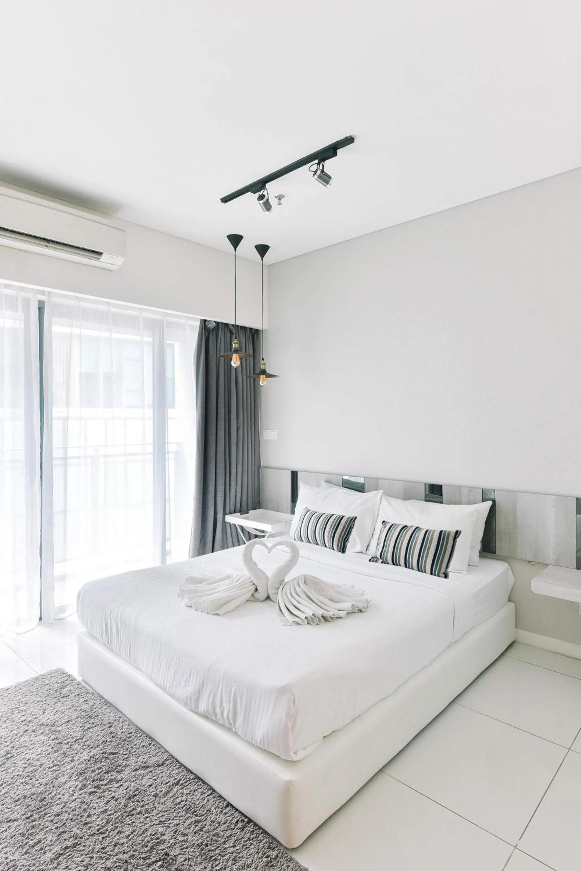Bedroom in Summer Suites Residences by Subhome