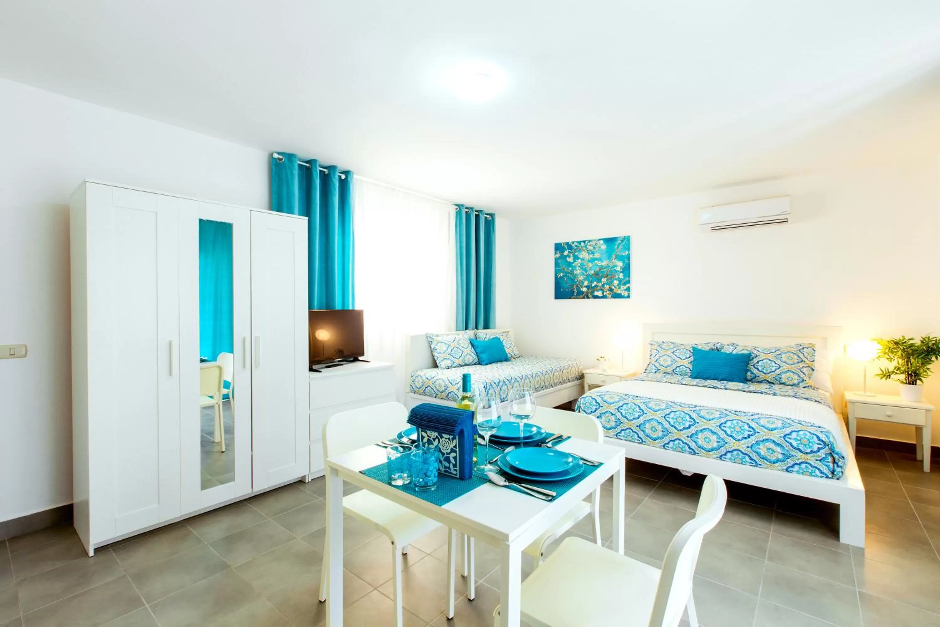 Bedroom in TROPICANA SUITES DELUXE BEACH CLUB and POOL - playa LOS CORALES