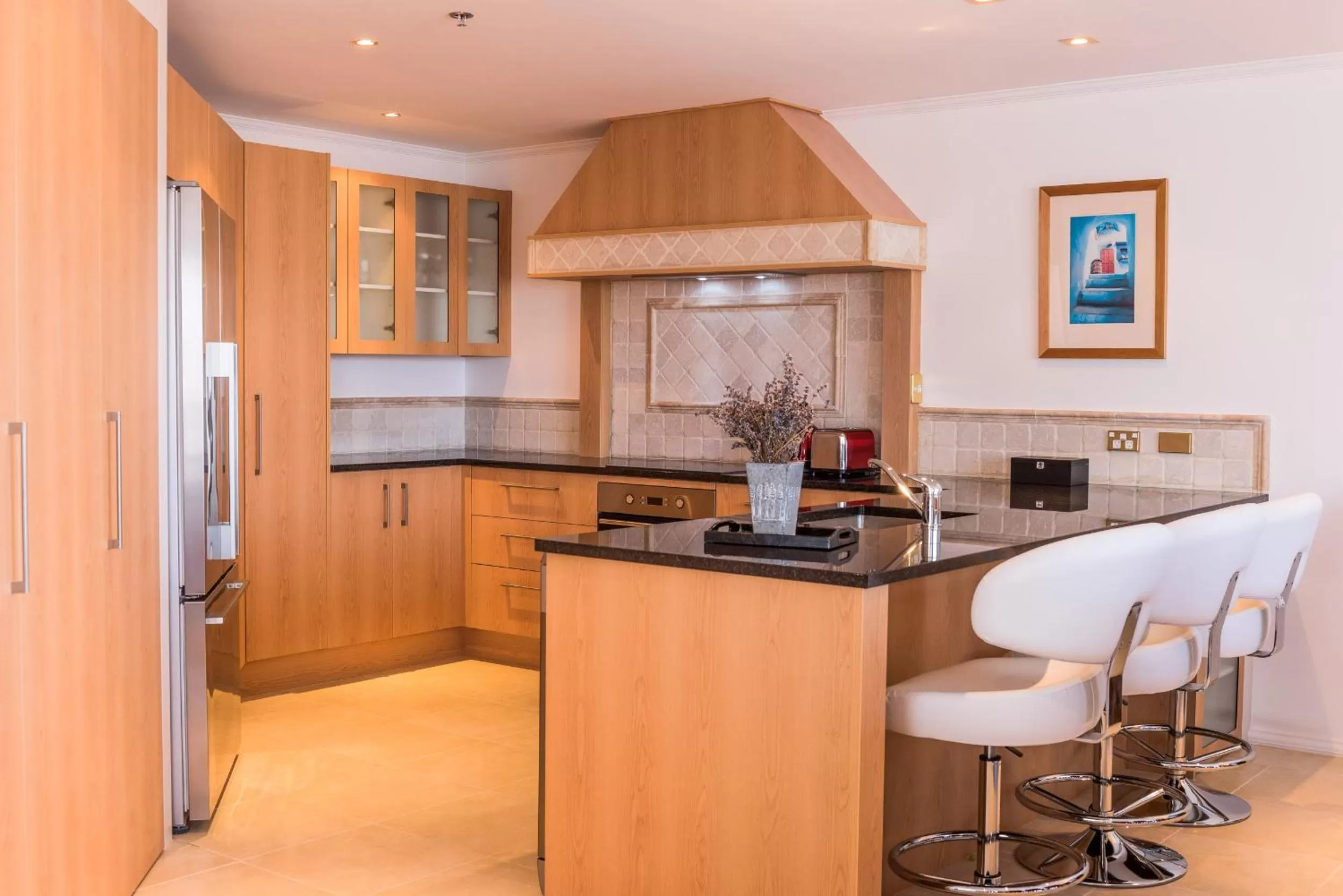 Kitchen or kitchenette in Fino Hotel & Suites