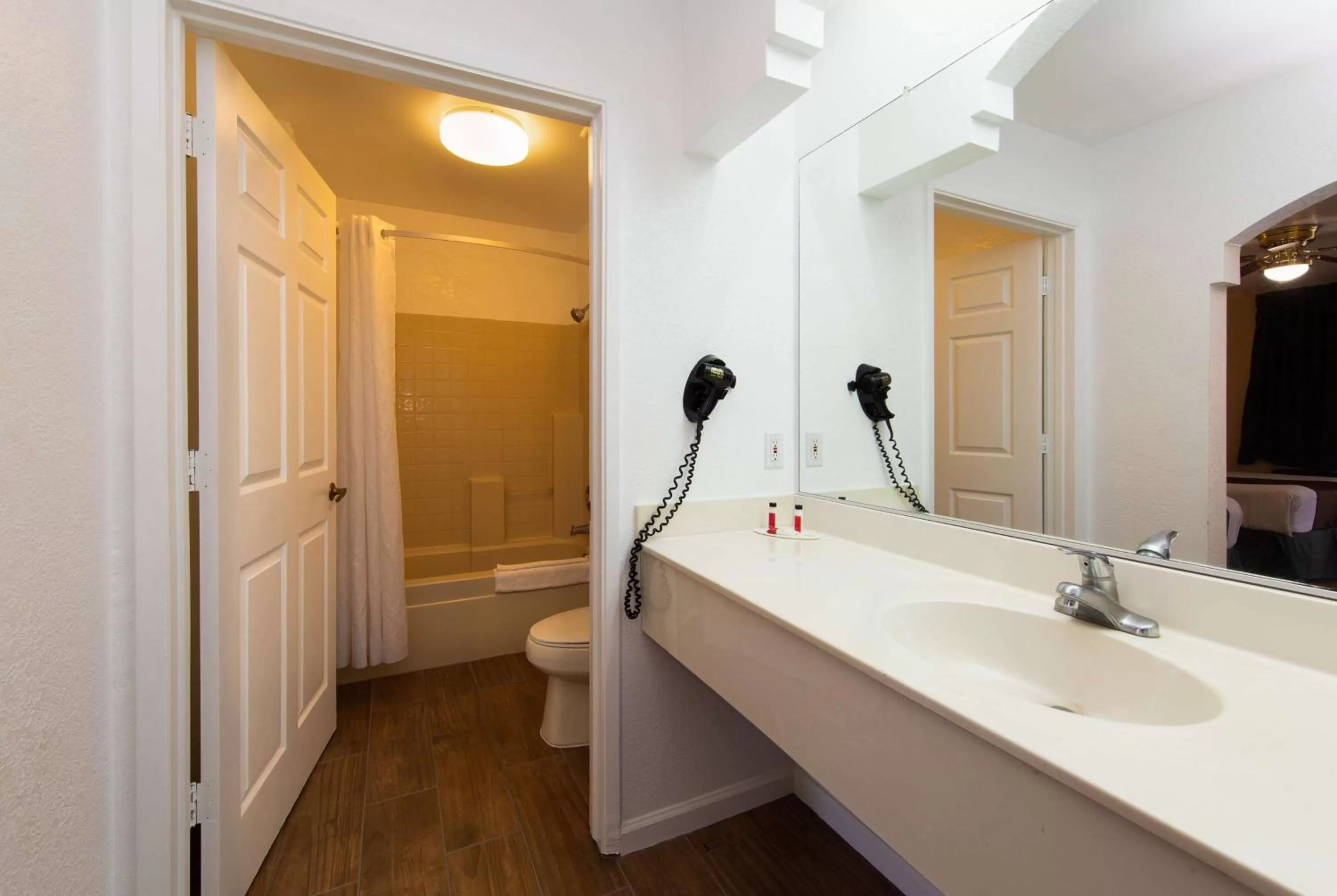 Bathroom in Travel Lodge by Wyndham Merced Yosemite