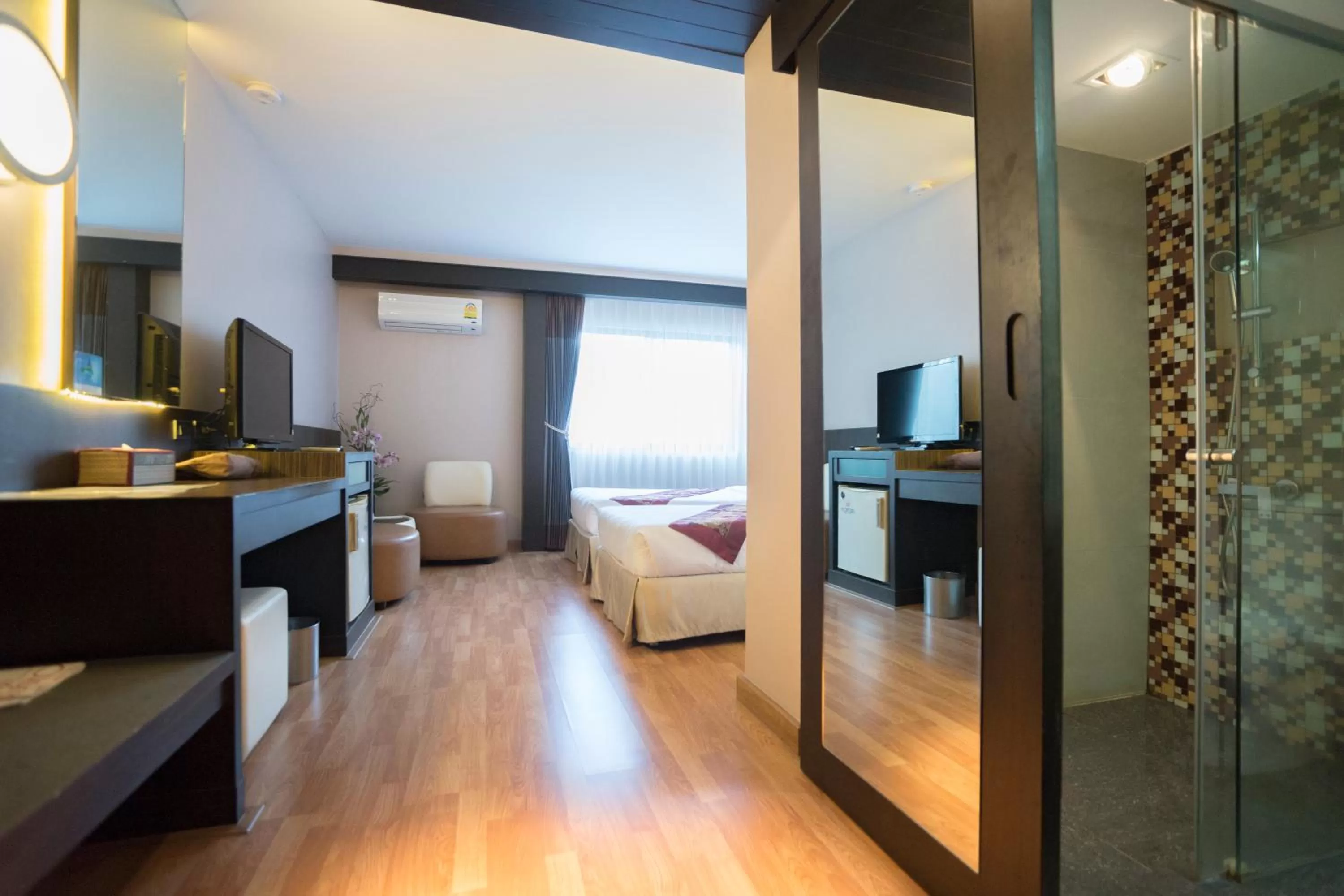 Bed in Kiss Gardenhome Chic Hotel