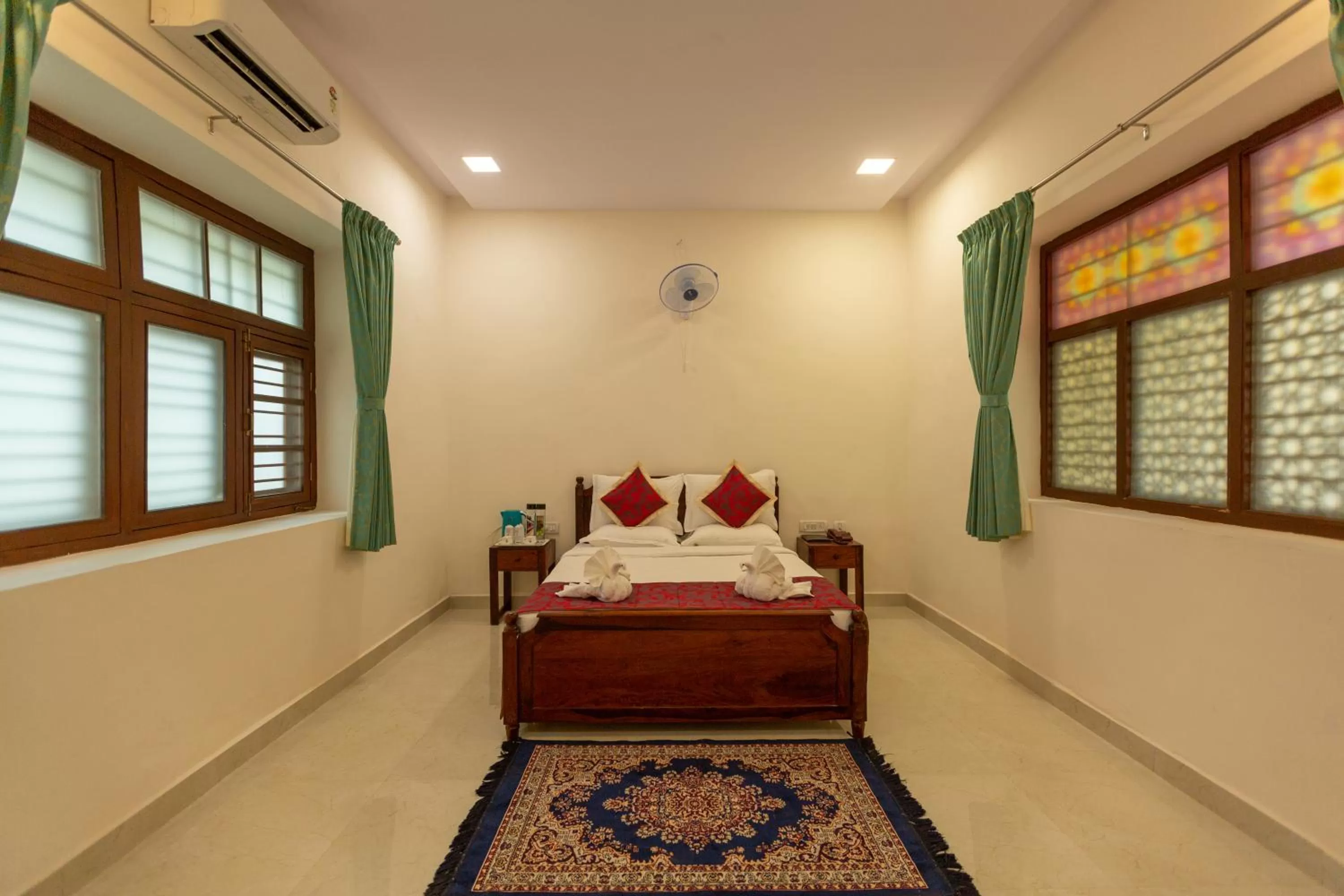 Bed in KSTDC Hotel Mayura Adilshahi Bijapur