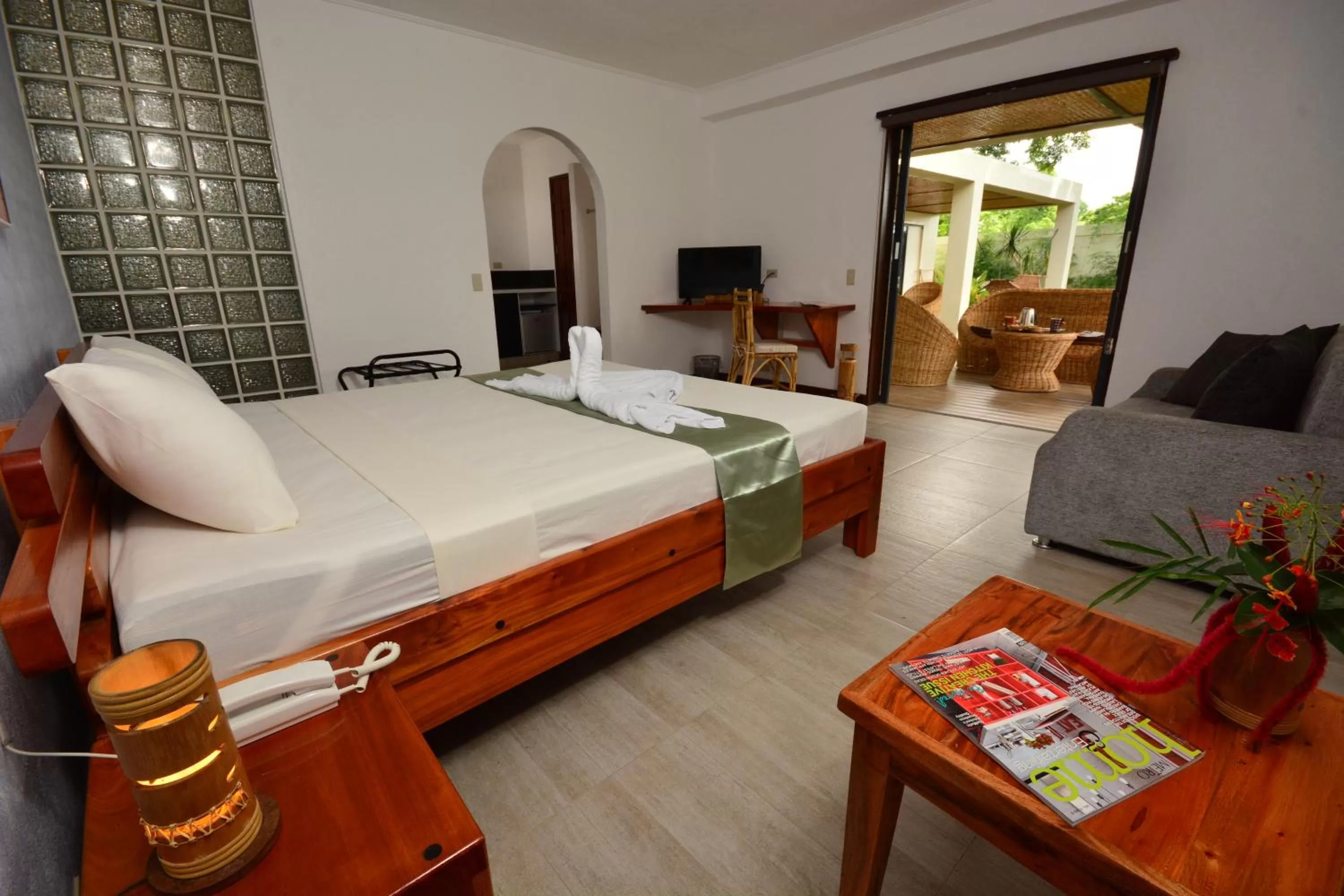 Photo of the whole room, Bed in Munting Paraiso