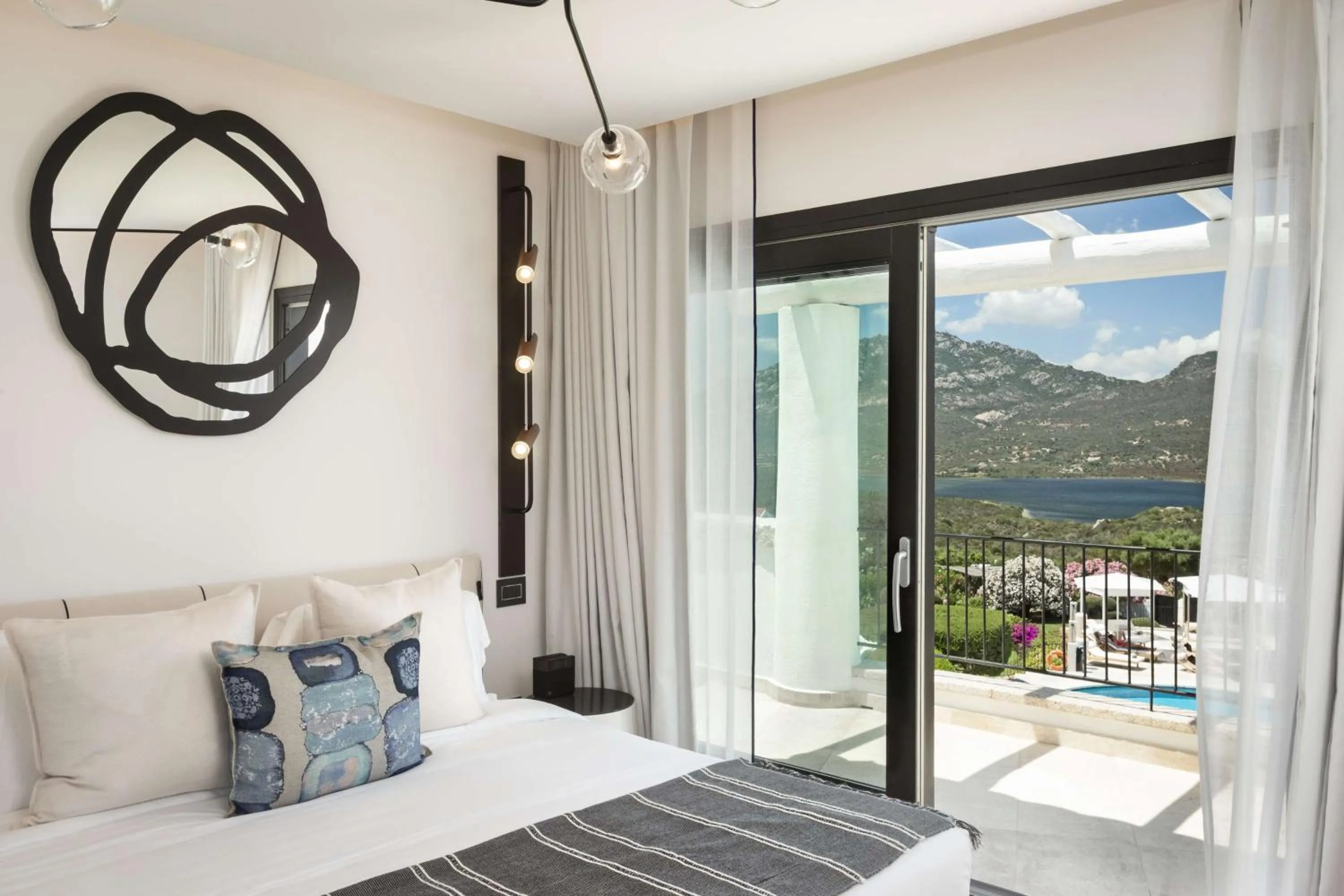 Bed in Sulià House Porto Rotondo, Curio Collection by Hilton