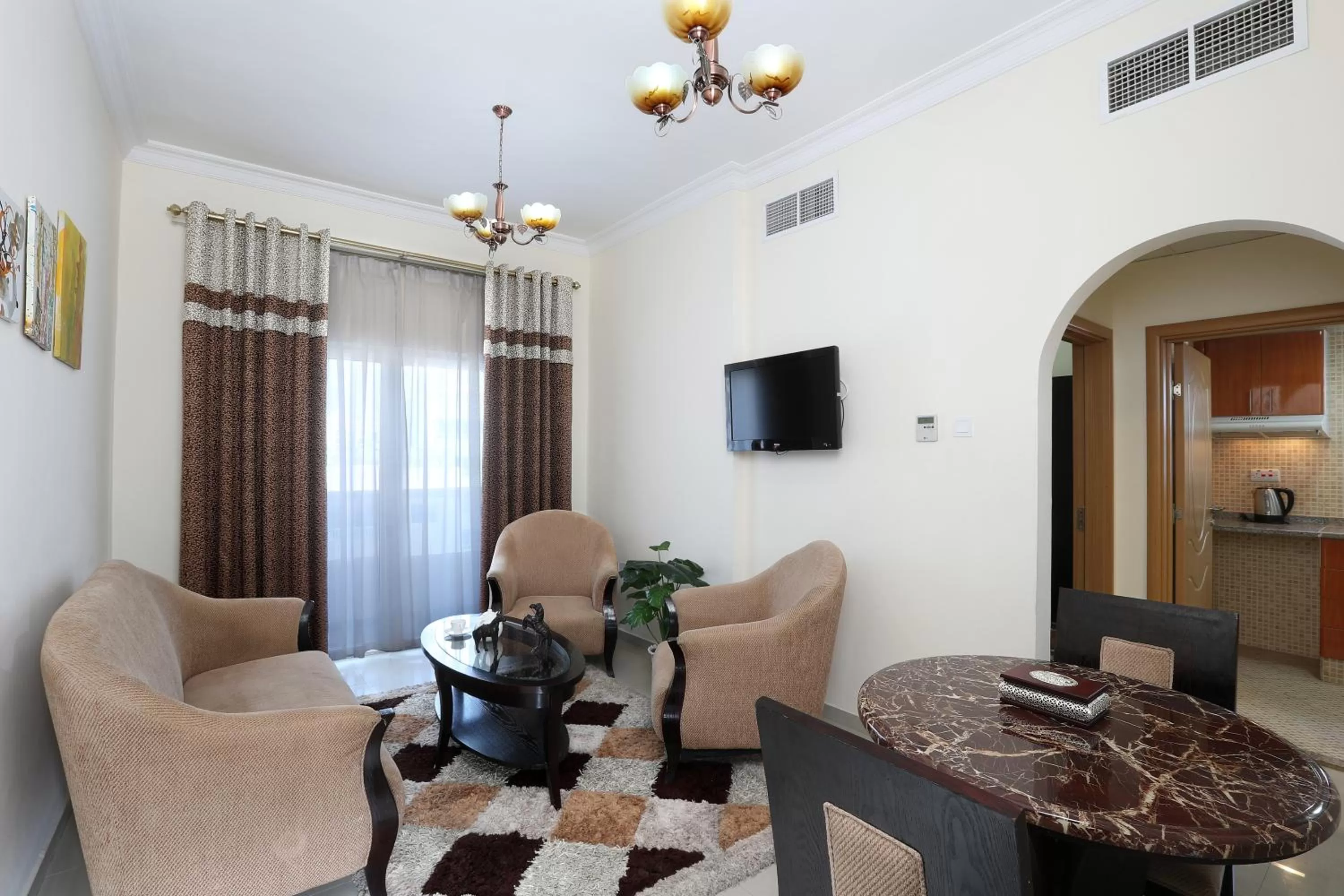 Living room in Al Smou Hotel Apartments - MAHA HOSPITALITY GROUP