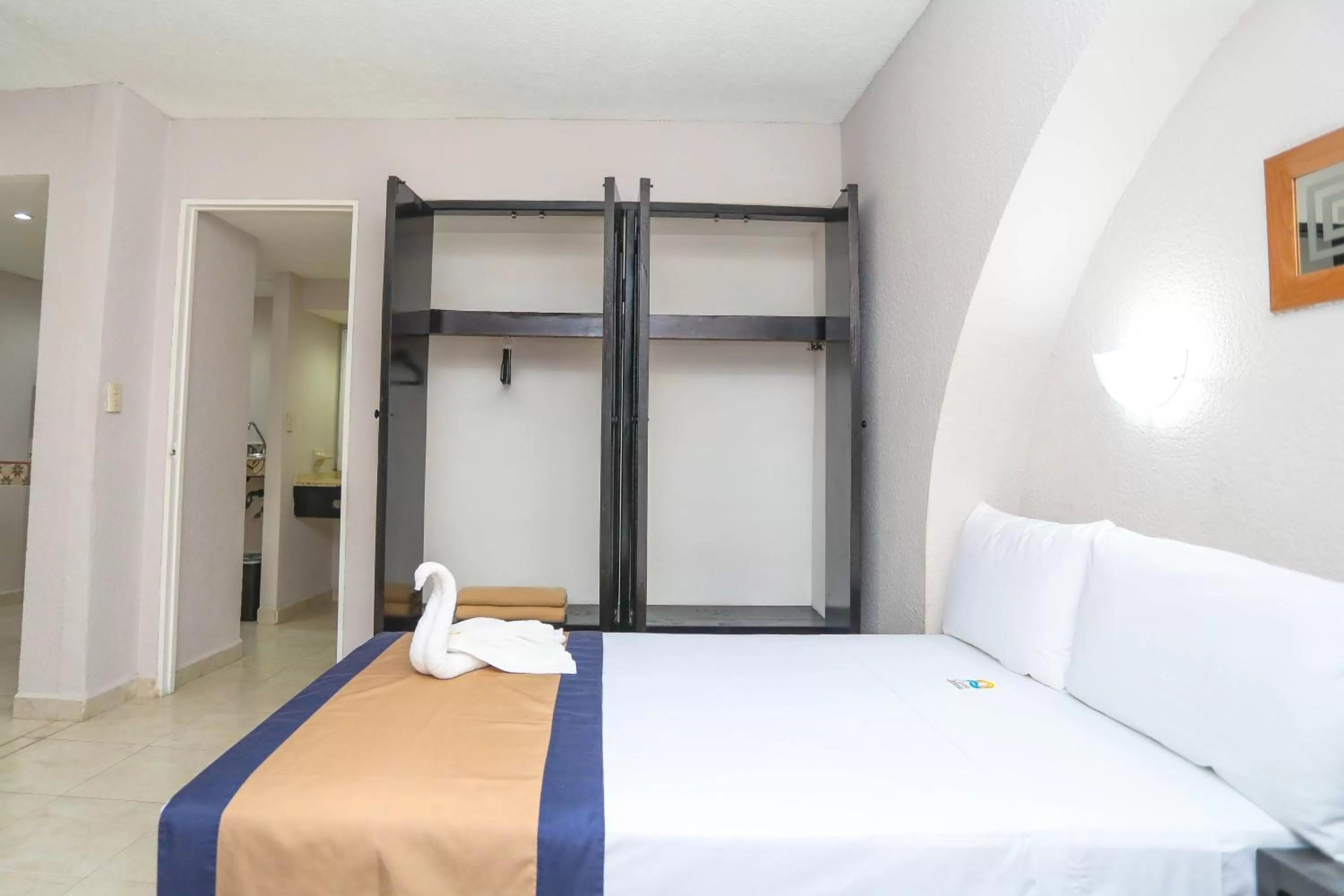 Bed in Hotel Caribe Internacional Cancun