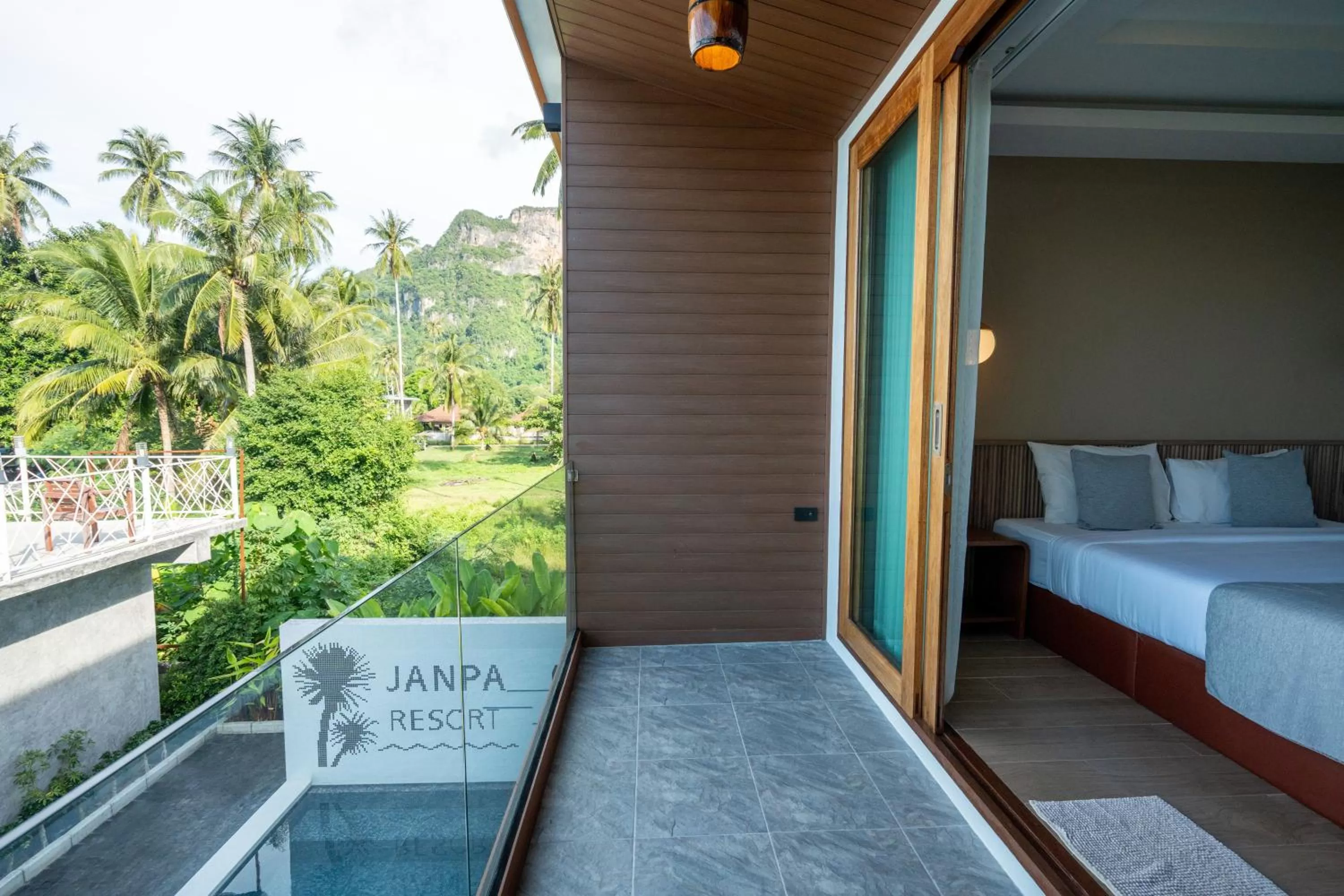 Balcony/Terrace, Bed in Janpa Resort