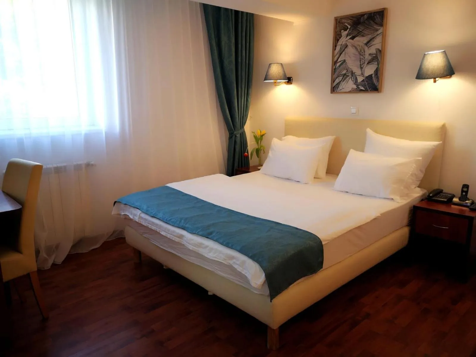 Bed in Atrium Hotel Bucharest City Center