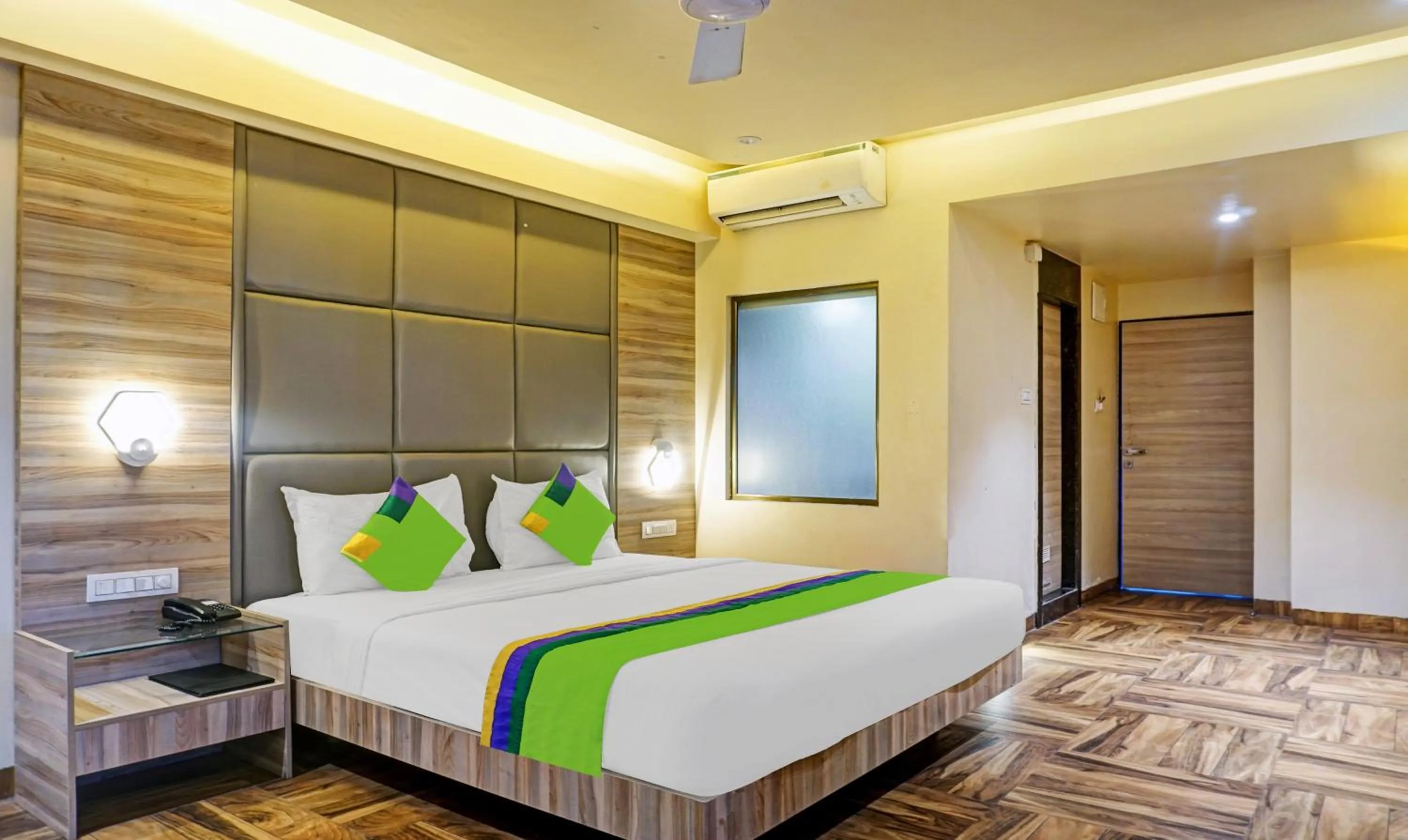 Bedroom, Bed in Treebo Classic Grande, Camp