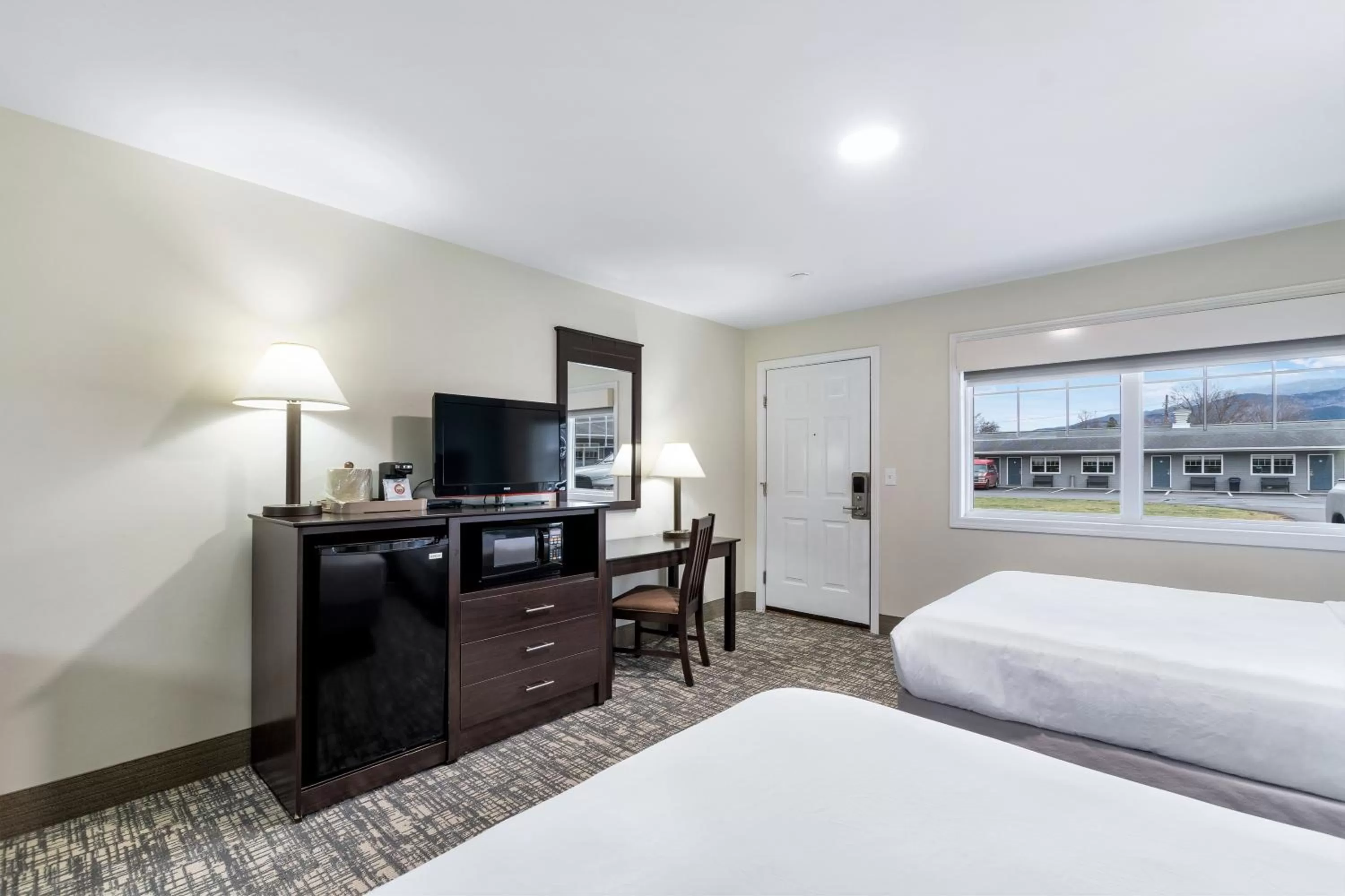 Bed in Top Notch Inn